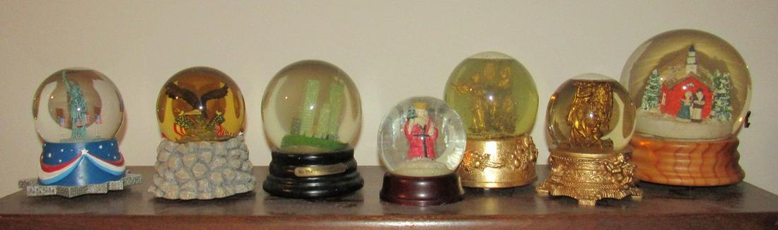 7 Snow Globes: Tallest is approx 7"