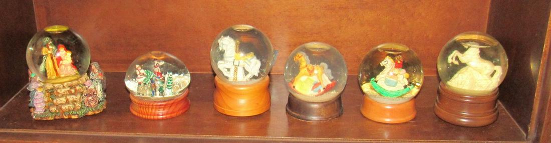 6 Snow Globes: Tallest is approx 5 1/2" .