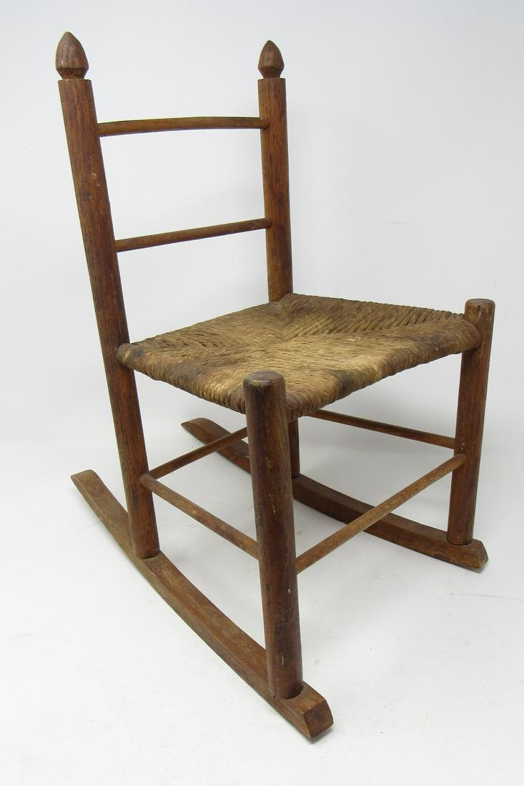 Doll Rocker with Rush Seat: Approx. 16 1/4" tall.