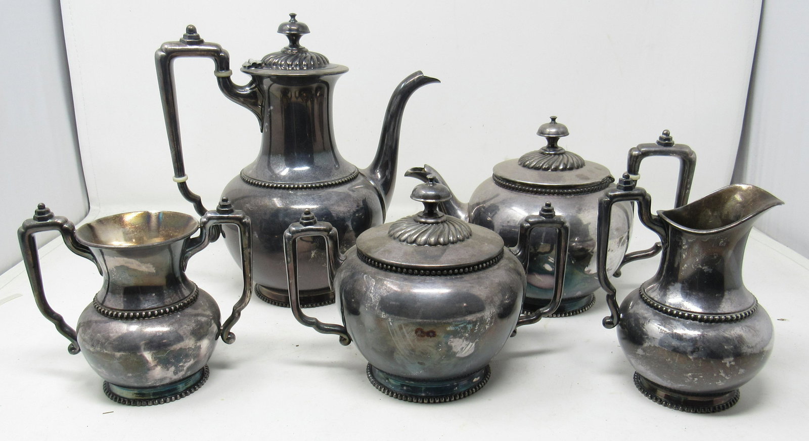 Quadruple Plate Silver Plate Gilt 5070 Tea Set: Largest teapotm is approx 9 1/2" tall