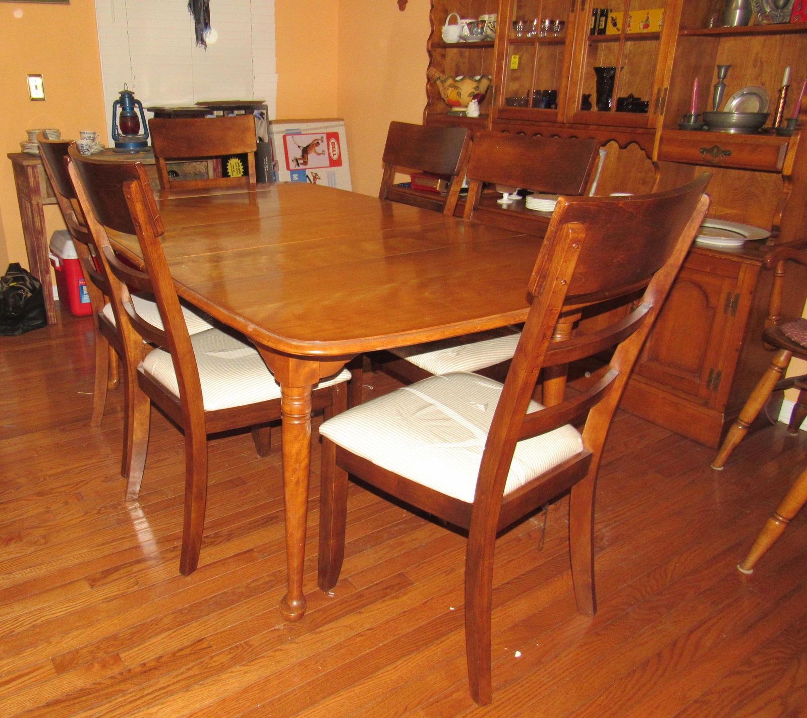 Cushman Colonial Creations Table & 6 Chairs: Table is approx 42" x 73" ( as pictured ), also comes with an extra leaf , and table pad.