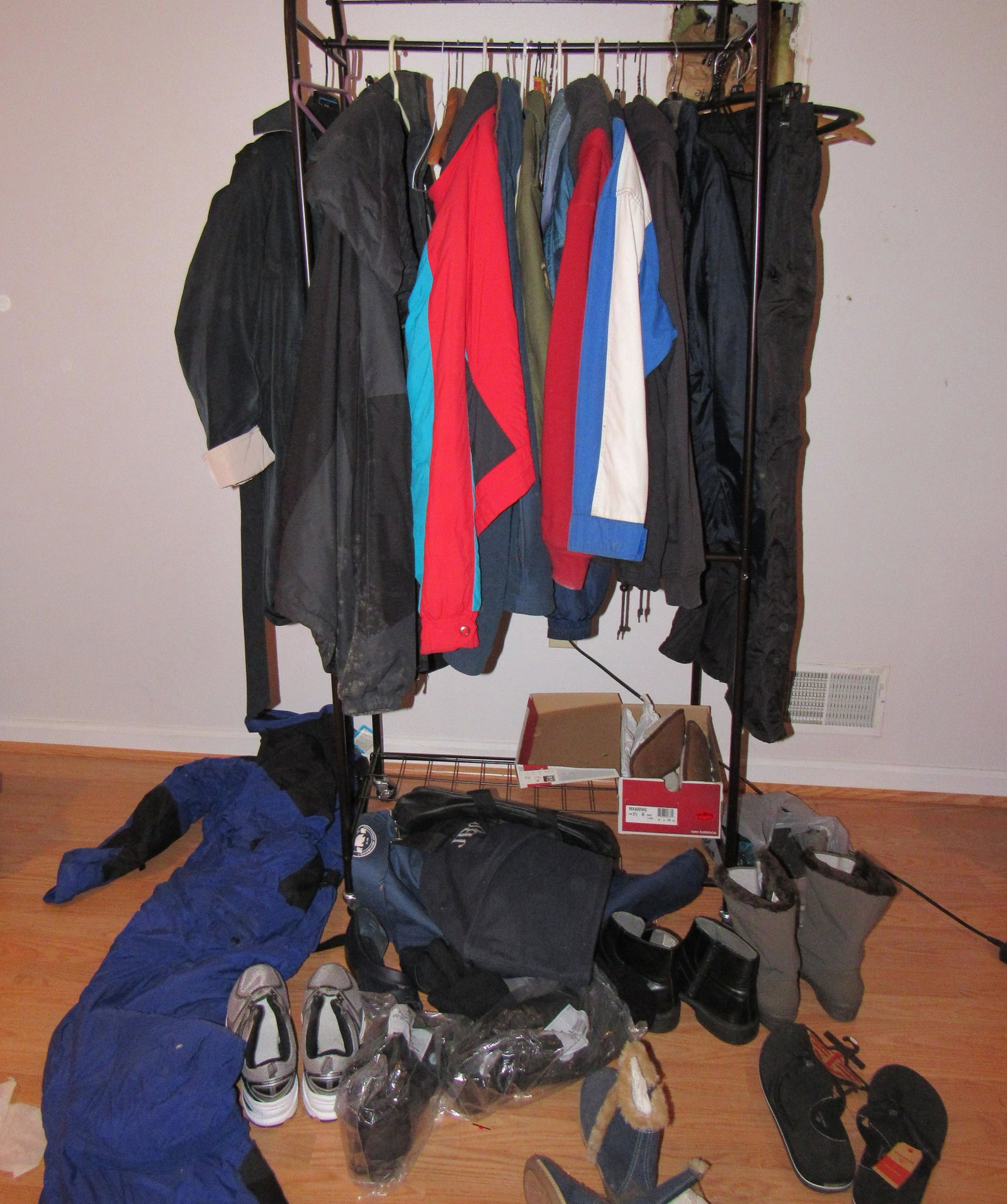 Winter Coats Snow Suit Shoes Clothing Rack: Lot includes all pictured. Looked at a couple jackets and they were Large and 2XL . Sketchers are used