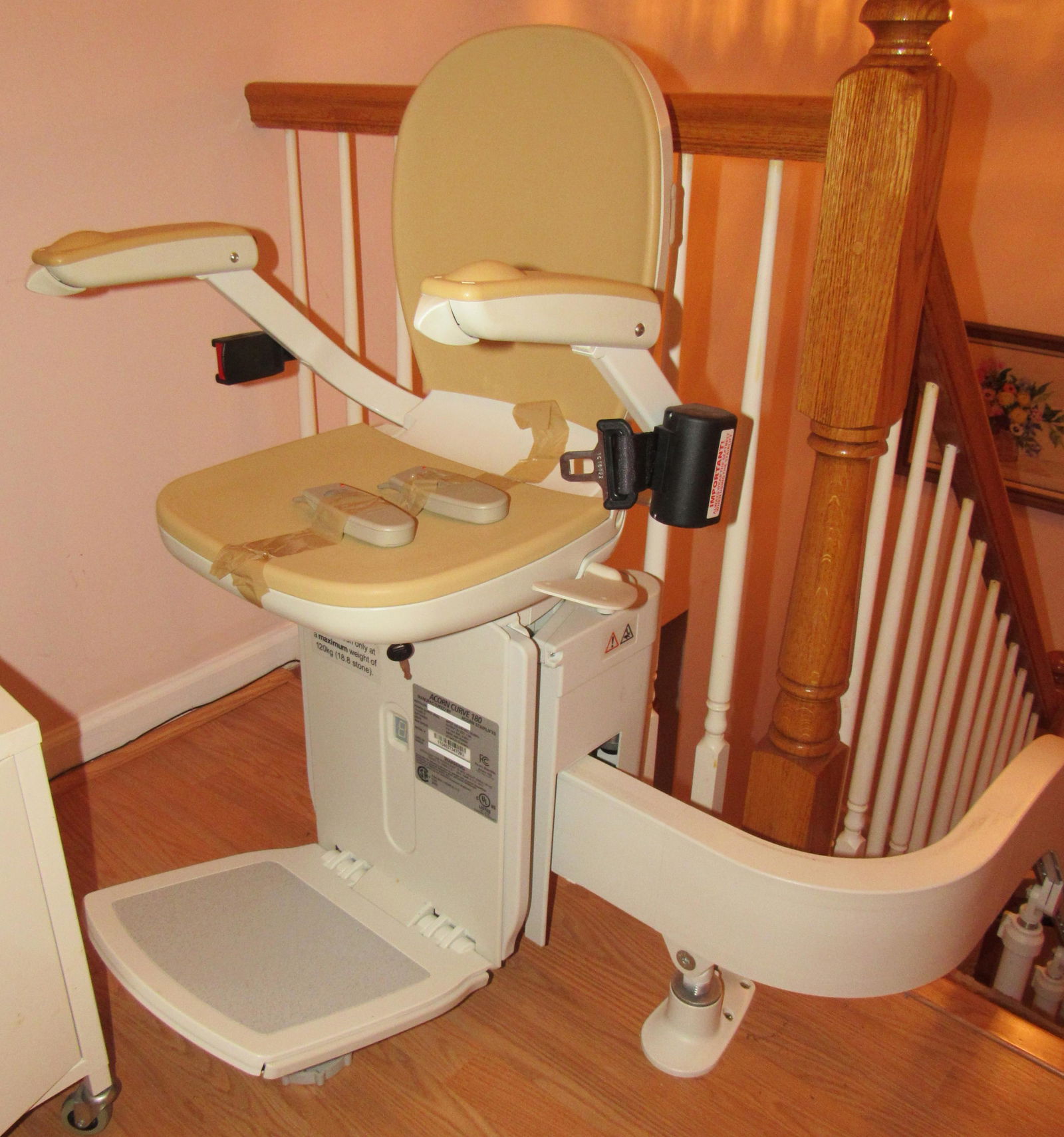 Acorn Curve 180 Stairlift: This goes 7 steps, then landing, another 7 steps then landing, another 7 steps then landing, up one step, the 7 more steps to top. Comes with 2 remotes. It is light, makes beeping sound. I am not fami