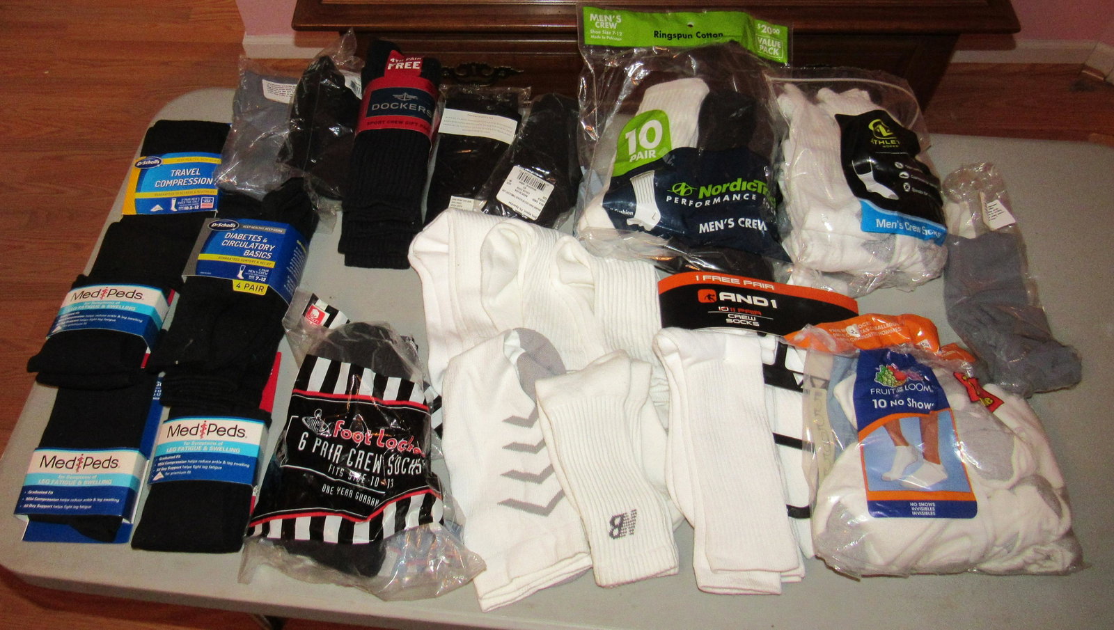 Lot of New Socks: All New ! All the white socks were opened, but are new. Some of the sizes are 7 or 8 -12.