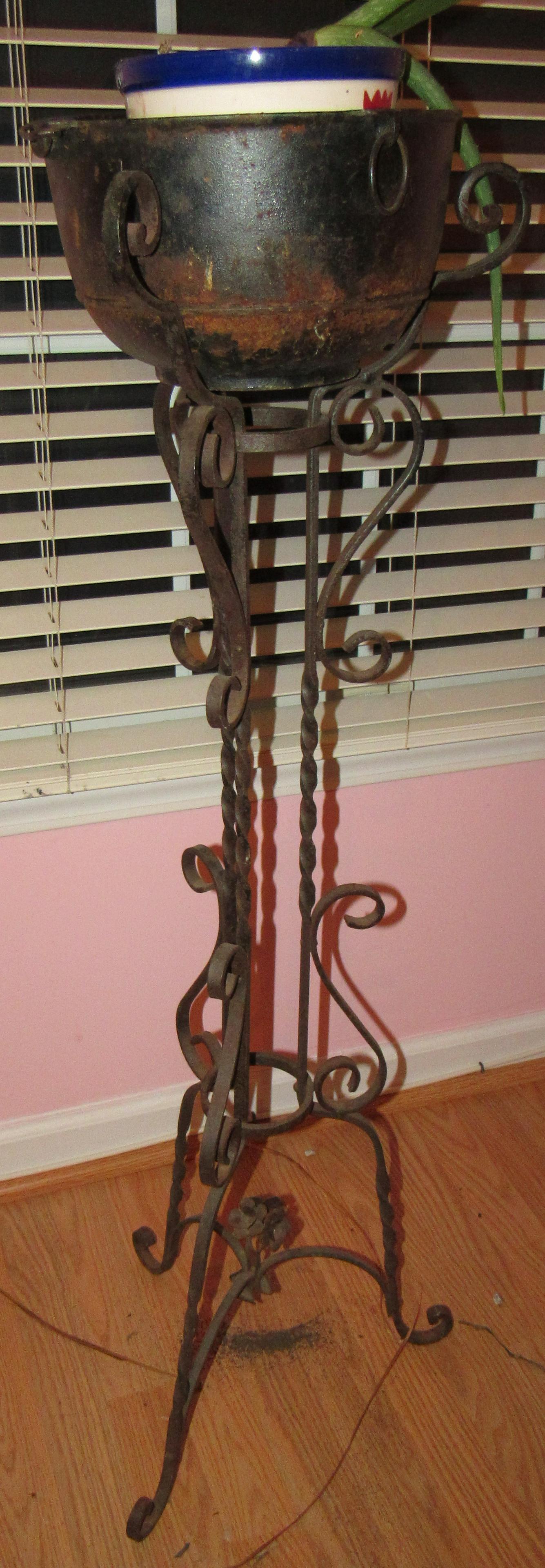 Wrought Iron Plant Stand with Cast Iron Kettle: Approx 43" tall. Kettle is approx 10 1/2" in diameter