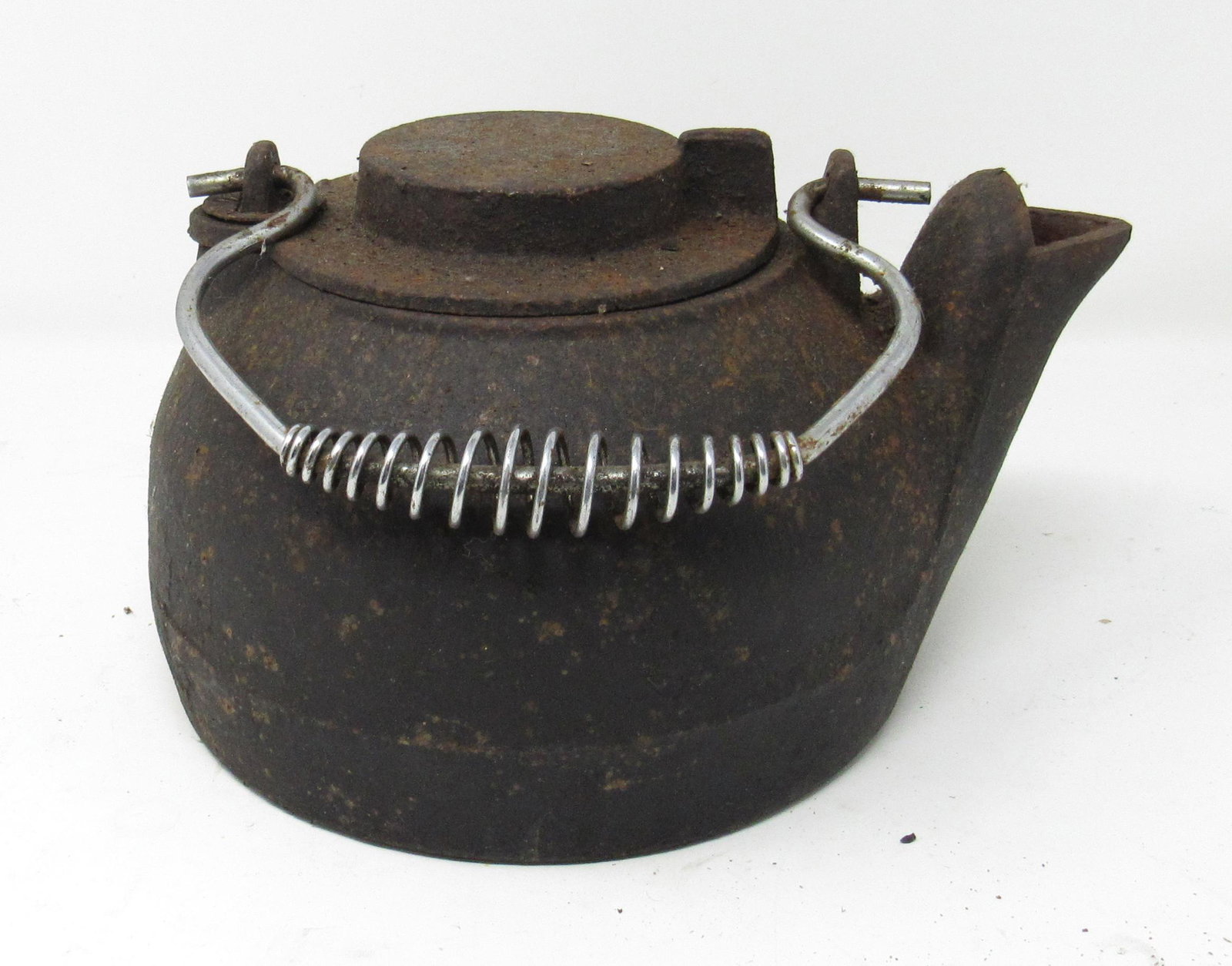 Cast IronTea Kettle: Approx 5 1/4" tall. Made in China
