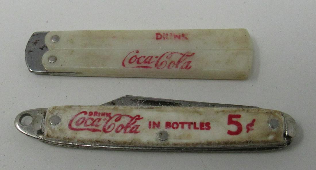 2 Coca Cola Pocket Knives: Bottom one is approx 2 7/8" long ( closed)