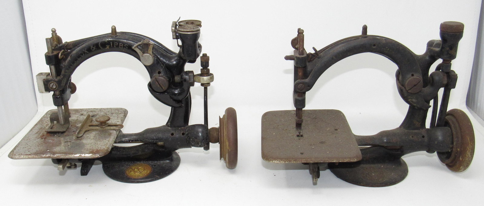 2 Willcox and Gibbs Sewing Machines: Approx 10 1/4" and 10 3/4" long.