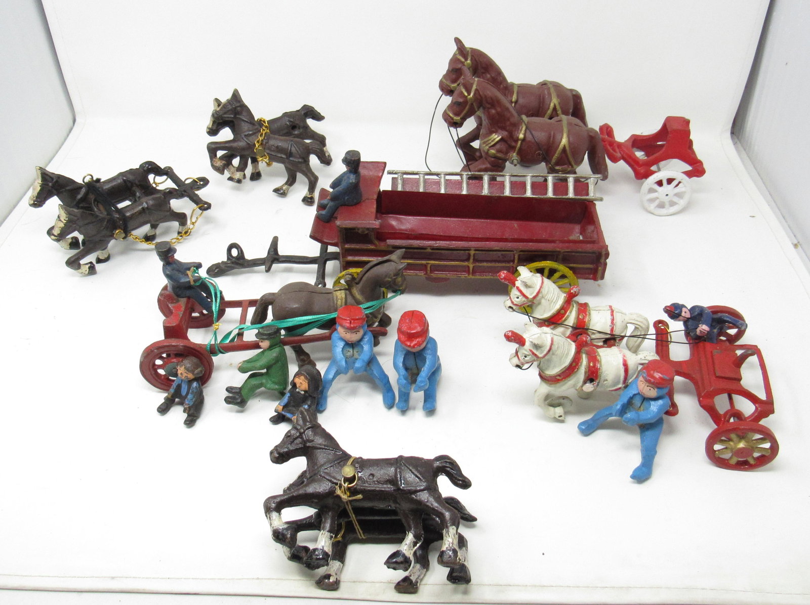 Horse Drawn Cast Iron Toy Parts: Lot includes all pictured. Largest in back is approx 5 3/4" tall