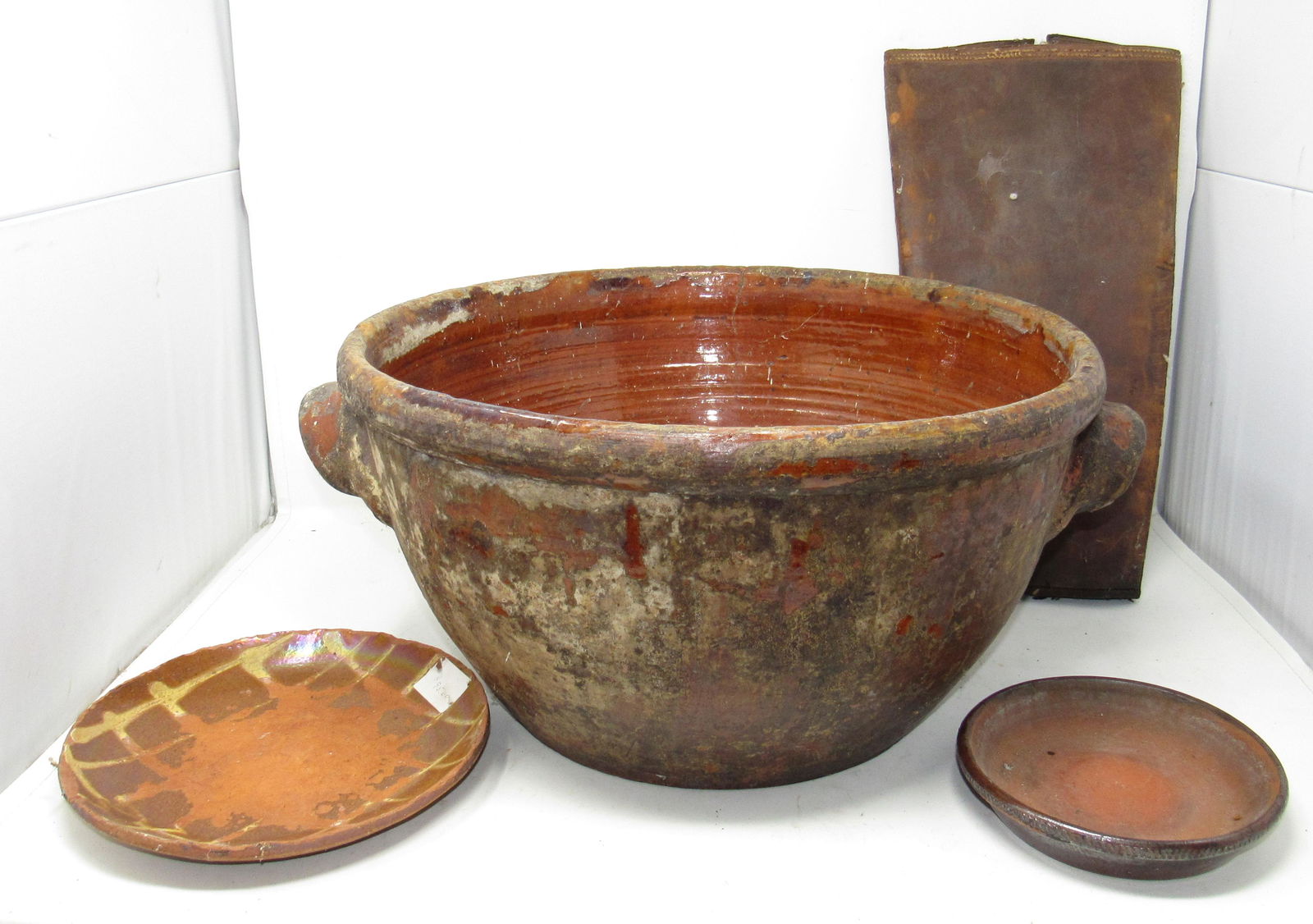 Huge Redware Bowl Pie Plates Leather Quiver: Bowl is approx 17" in diameter and 9 1/4" tall.