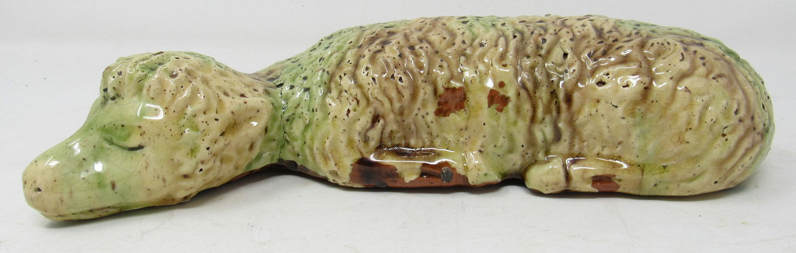 Robert Stauffer Glazed Redware Sheep: Approx 11" long. It is signed in the pottery