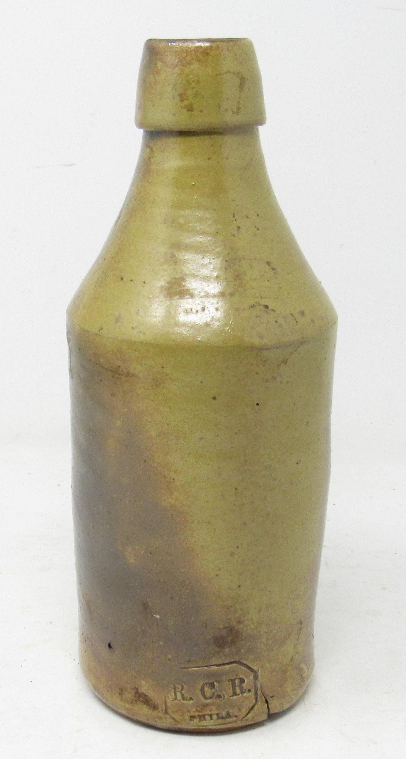 RCR Philadelphia Stoneware Bottle R. Remmy: Apprx 10" tall
