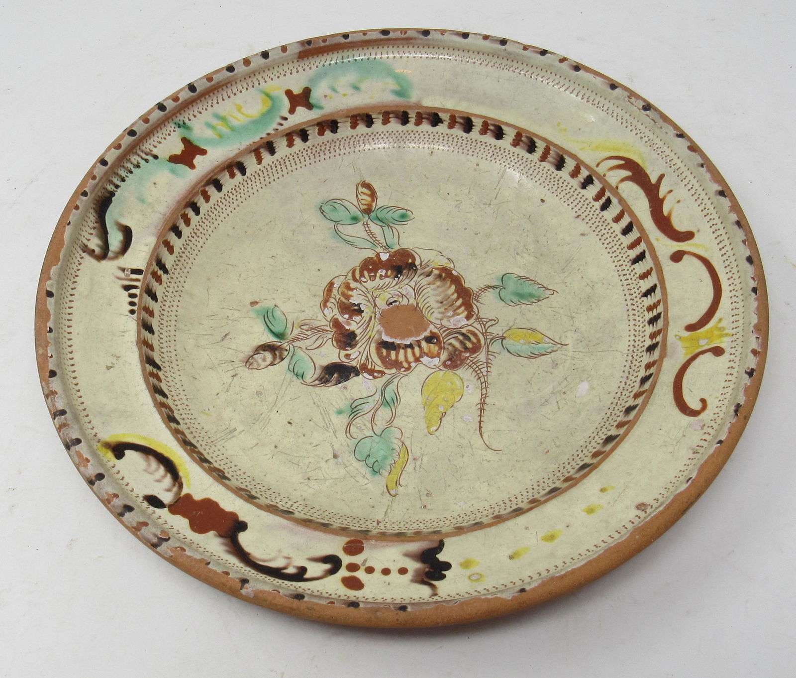 Decorated Redware Bowl: Approx 12 1/4 "in diameter and 2 1/8" tall.