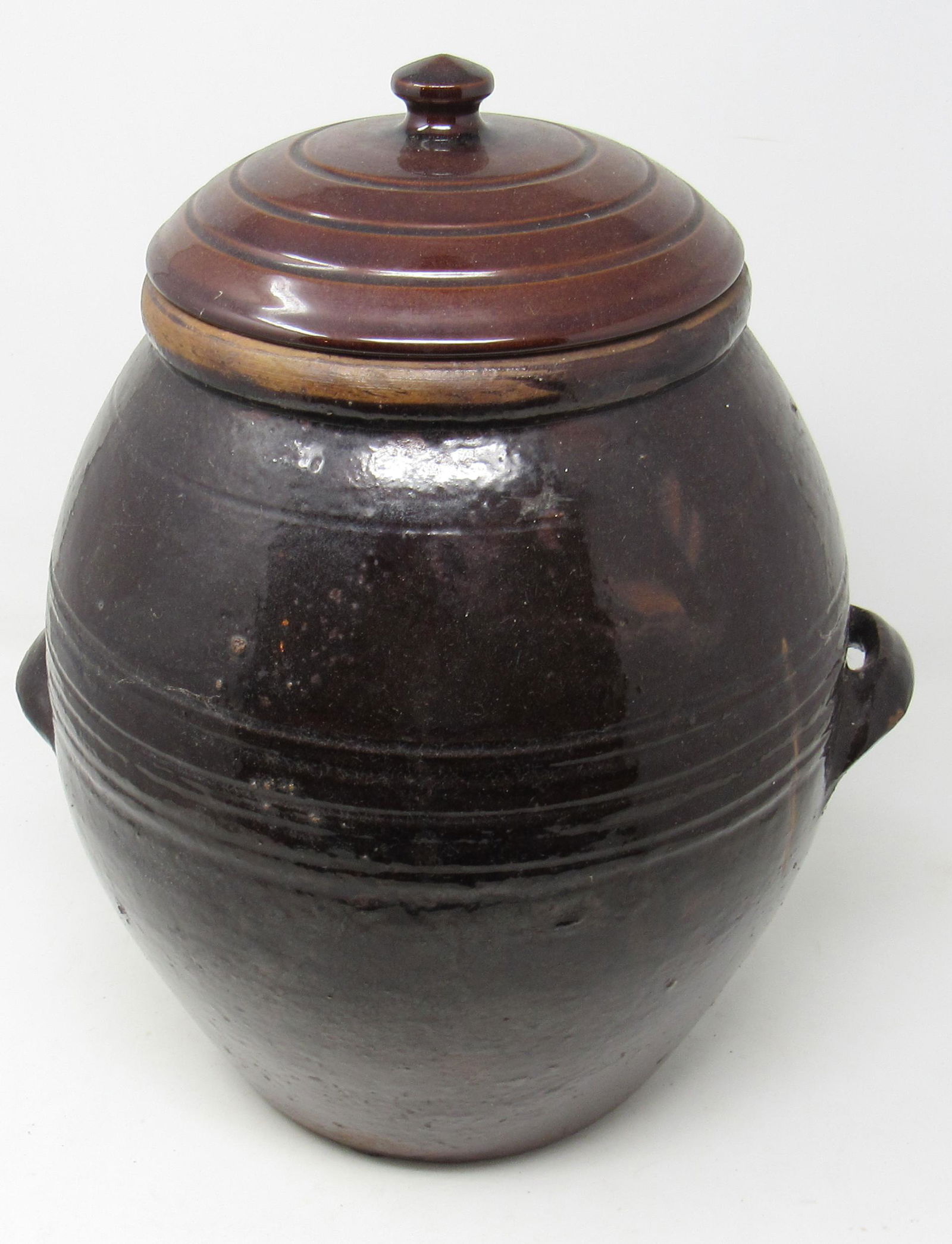 Redware Crock: Approx 11 1/2" handle to handle and 11 1/4" tall ( not including height of lid ) . Lid is not the right one.