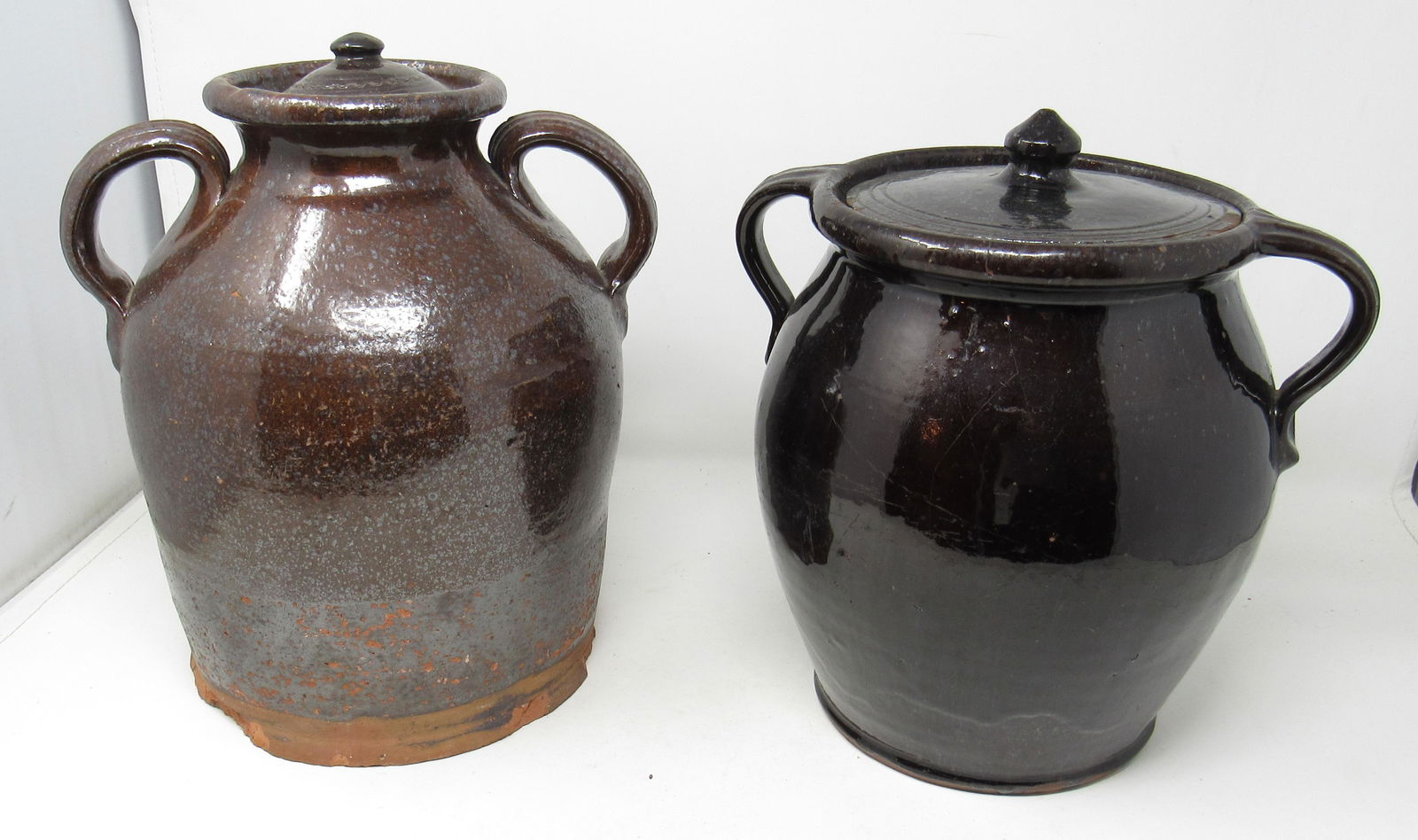 2 Redware Pottery Lidded Crocks: Tallest is approx 11" tall.