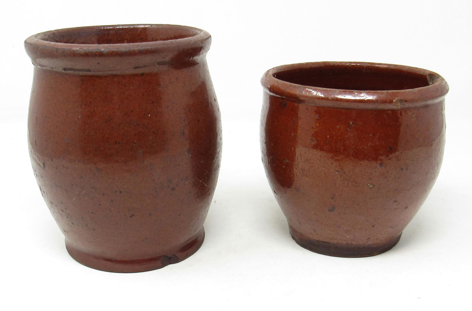 2 Redware Pottery Crocks: One on left is apprx 4 1/2" in diameter and 6" tall.