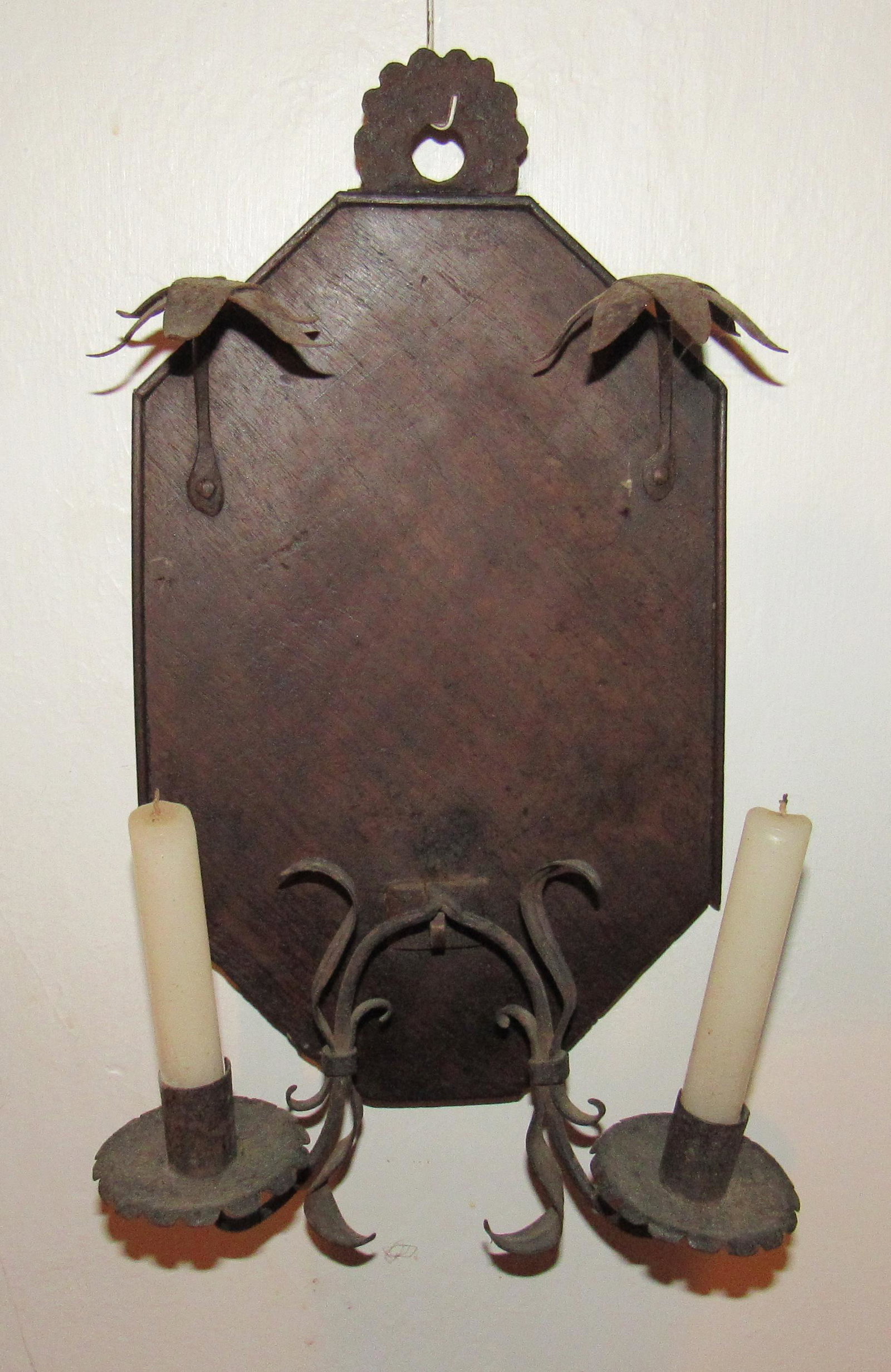 Unusual Iron Candle Sconce w/ Smoke Shields: Approx 7 1/2" x 14 1/2" . Candle holder is removeable. Iron sconces mounted on wood.