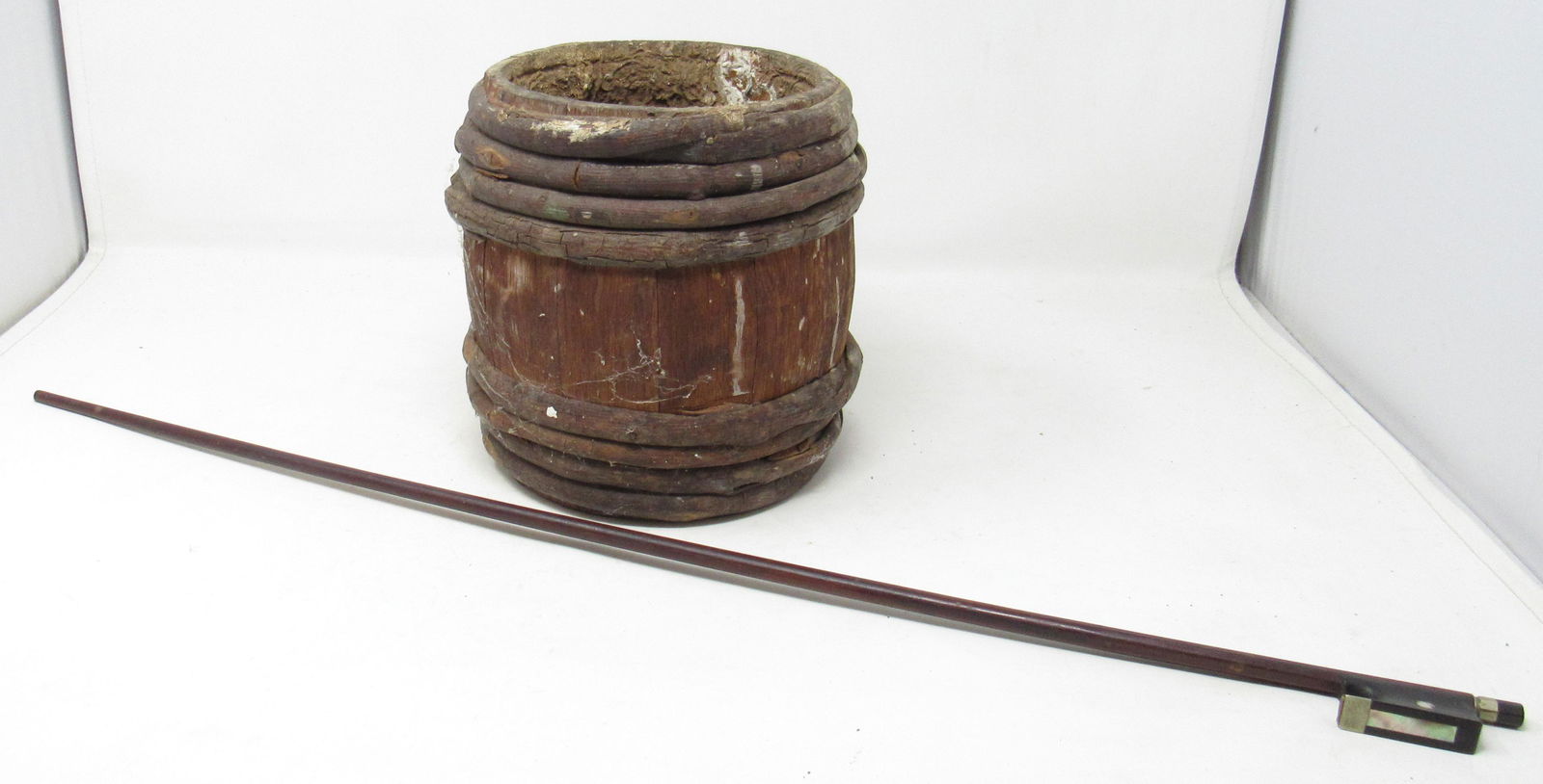 Pottsville Pa Wooden Keg and Violin Bow: Keg is approx 7" in diameter and 7 3/4" tall.