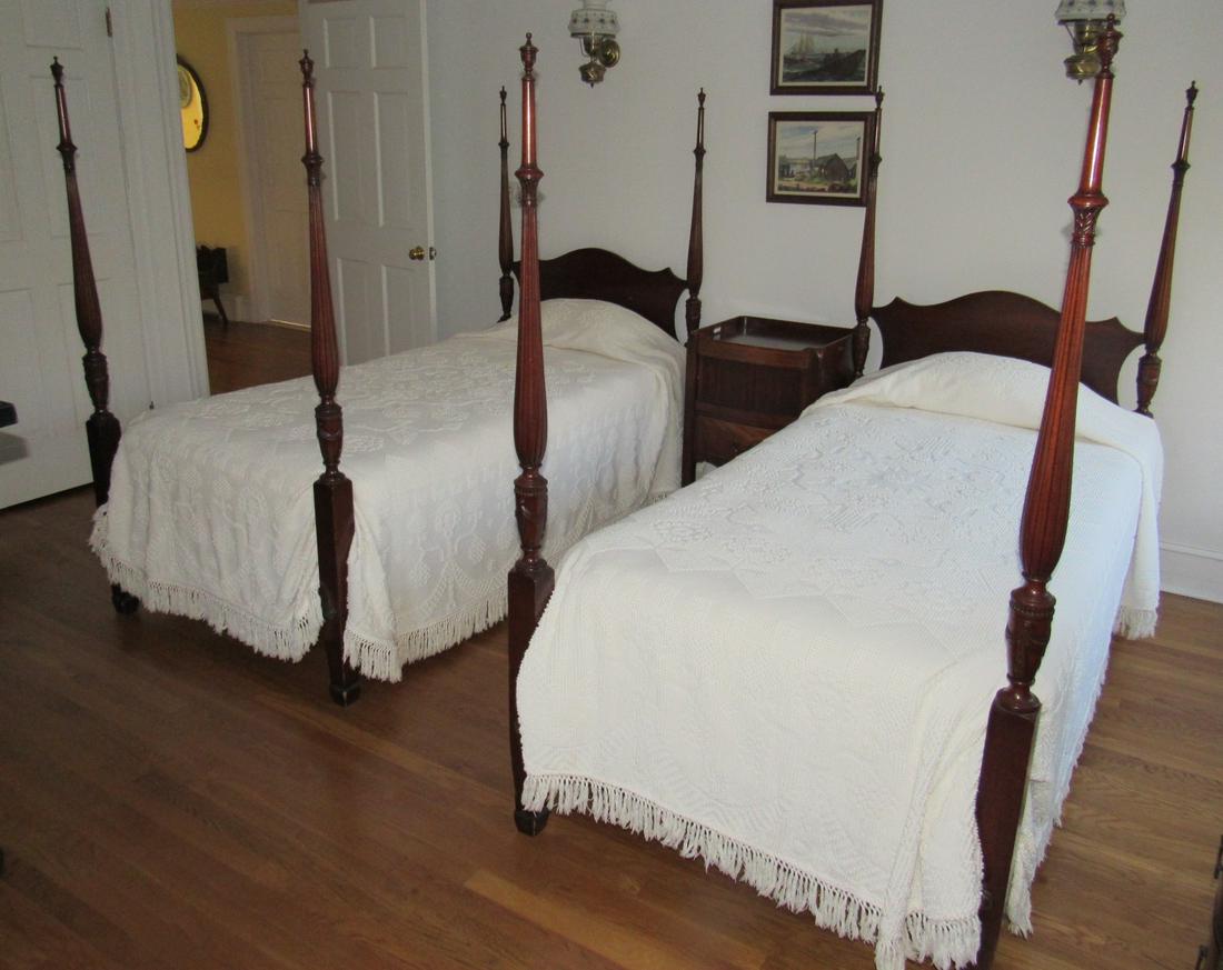 Pair of Mahogany Twin Poster Beds: Does not include the bedspreads