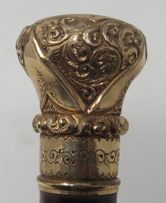 2 Antique Canes / Walking Sticks: Cane with " GOLD" end is approx 35 1/2" long and has some damage to shaft. Sold as is, as pictured