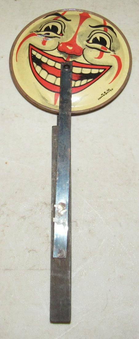 Antique Clown Noisemaker: Approx 4" in diameter and 10" long