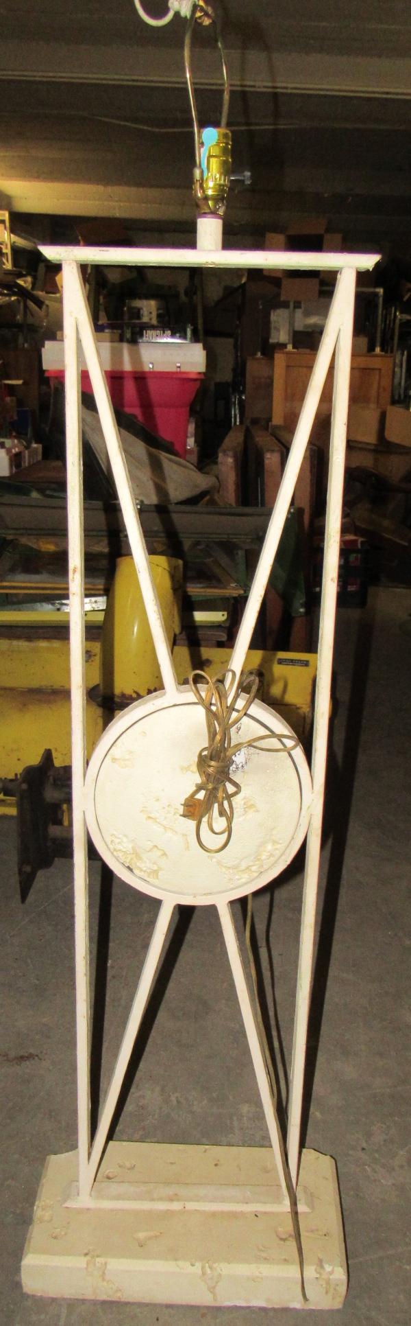 Metal Art Floor Lamp: Approx 62" tall. Base and circular center are plaster.