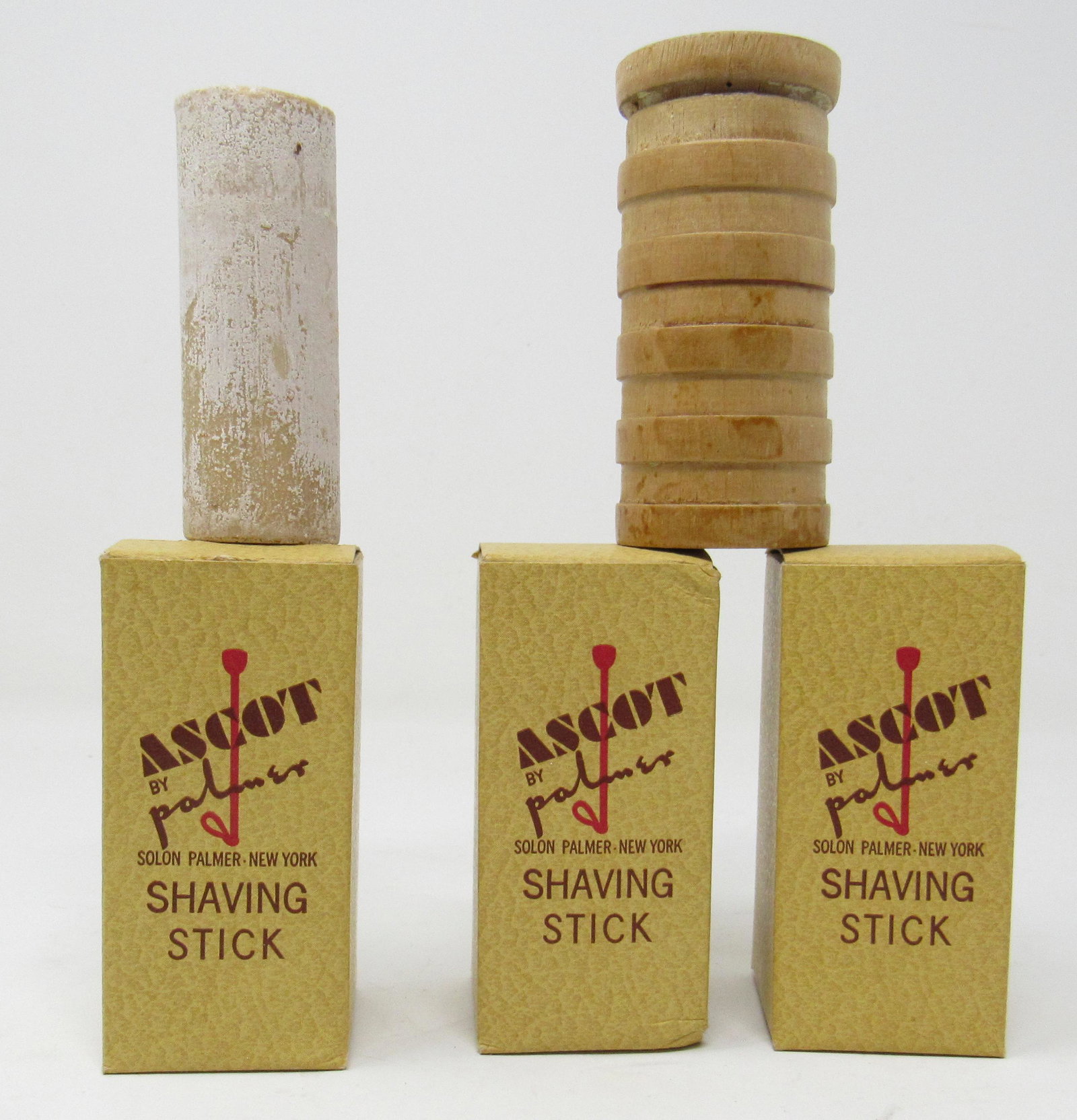 Ascot Palmer Shaving Sticks: There are 4 shaving sticks. 3 new old stock in the boxes and one not in box. They are approx 1 1/2" in diameter and 3 1/4" tall ( case measurements)