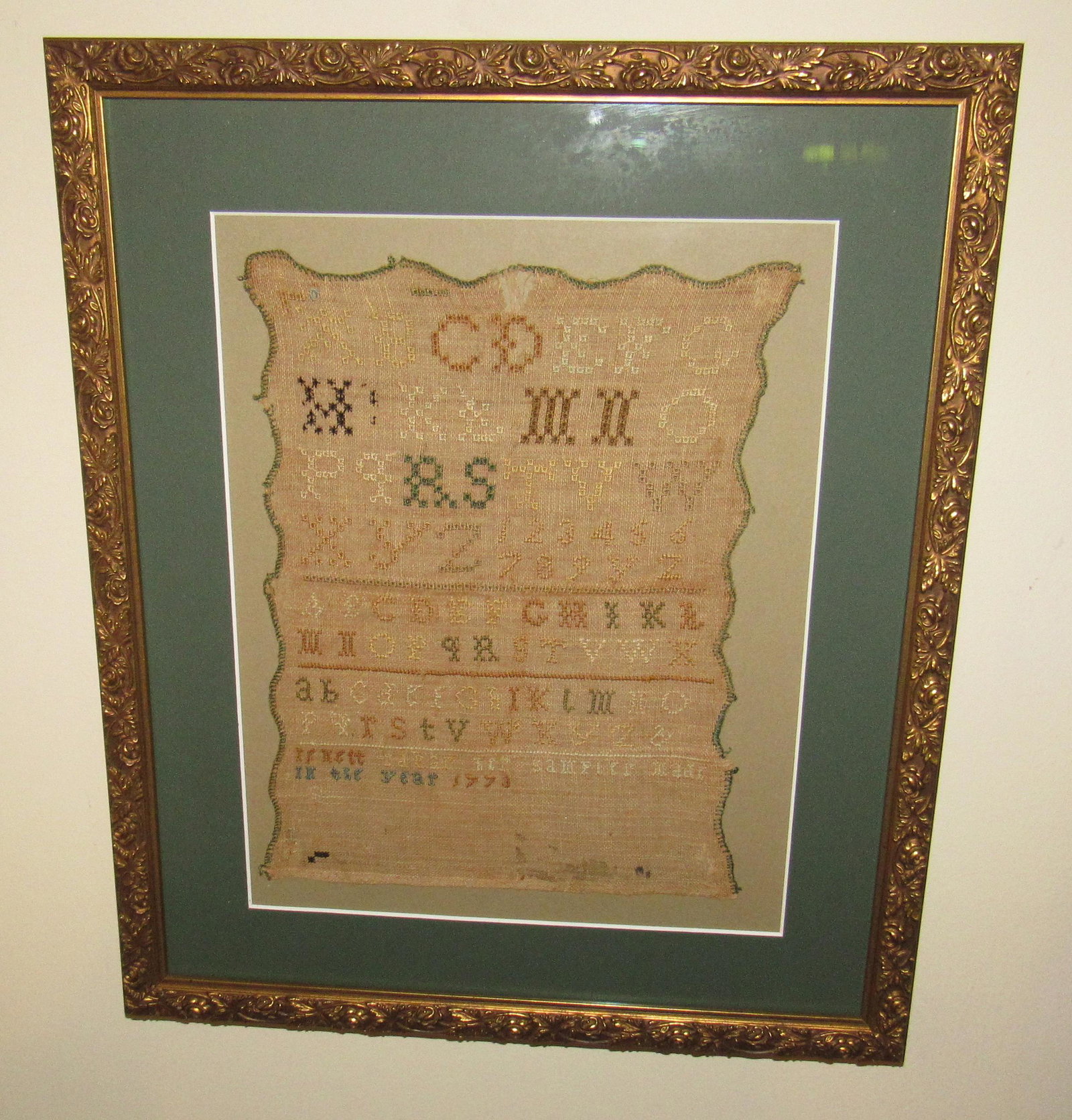 1773 Sampler Jenett Edgar: Frame is approx 14" x 17". Sampler is approx 8 3/4" x 11"