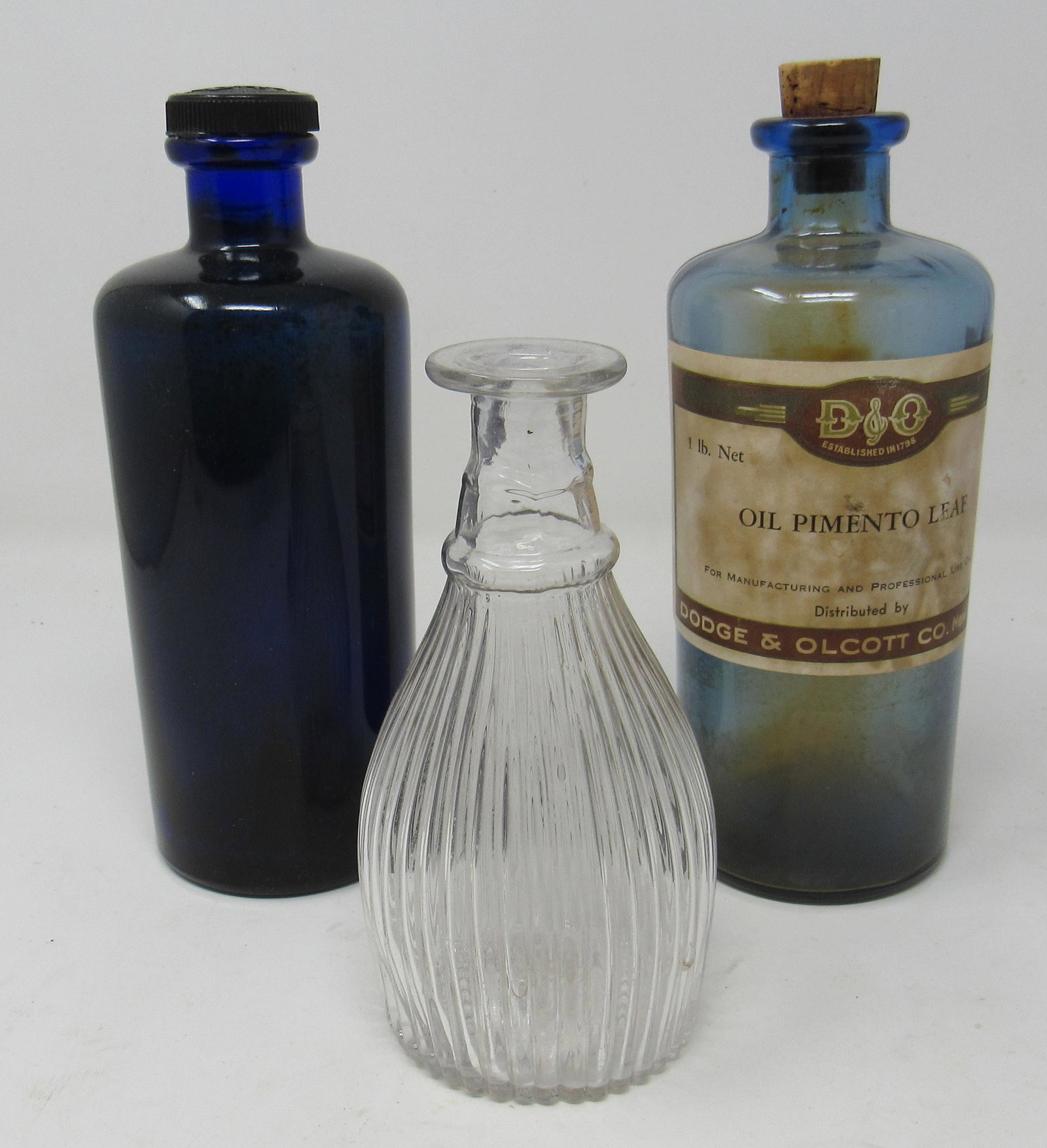 Dodge & Olcott Oil Pimento Leaf & Misc Bottles: Tallest is approx 8" tall
