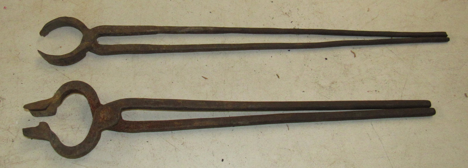 2 Pair of Blacksmith Tongs: Largest is approx 1 5/8" x 24"