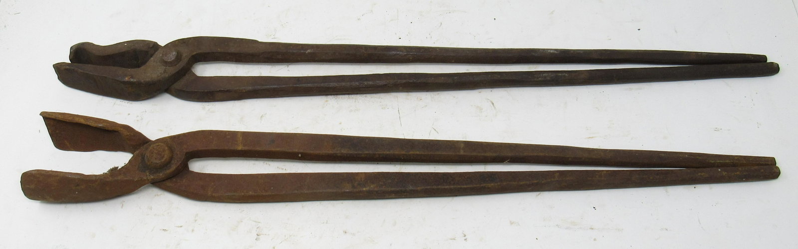 2 Pair of Blacksmith Tongs: Pair on bottom is approx 1 5/8" x 22 1/2"