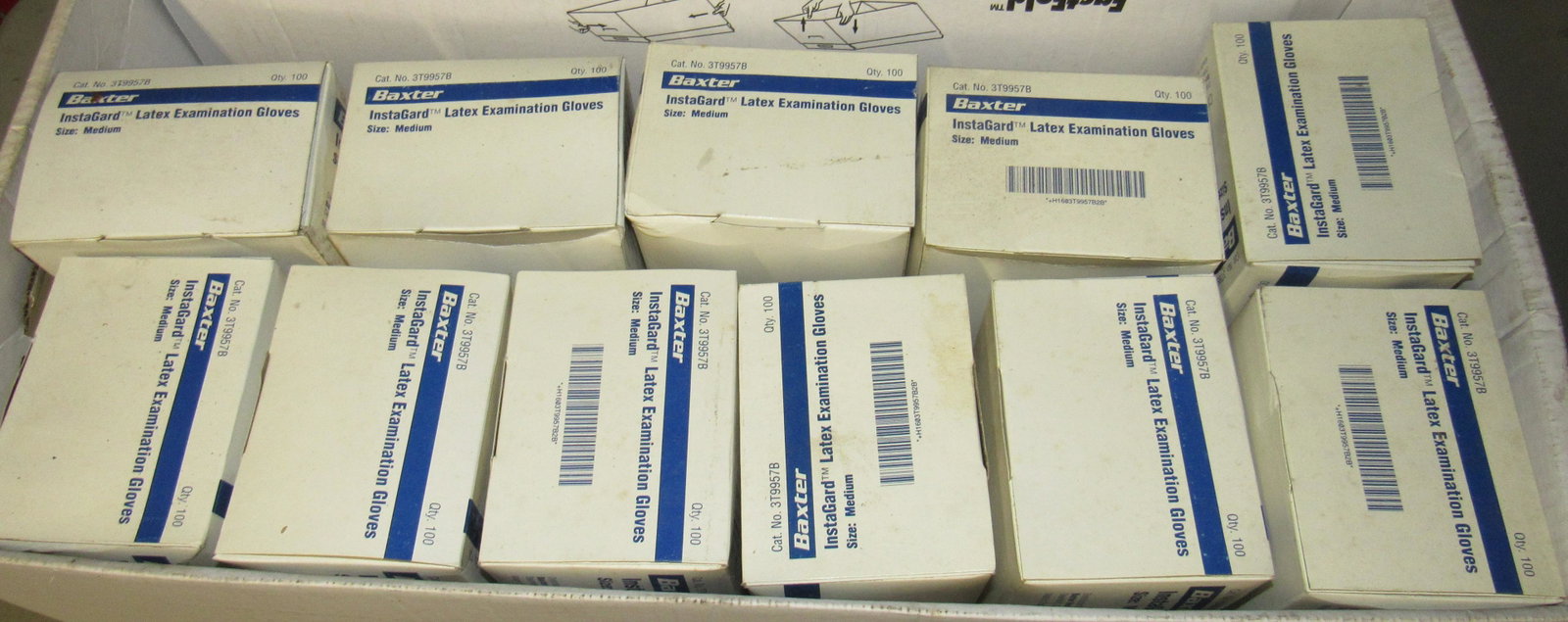 11 Boxes Baxter Size Medium Examination Gloves: New gloves