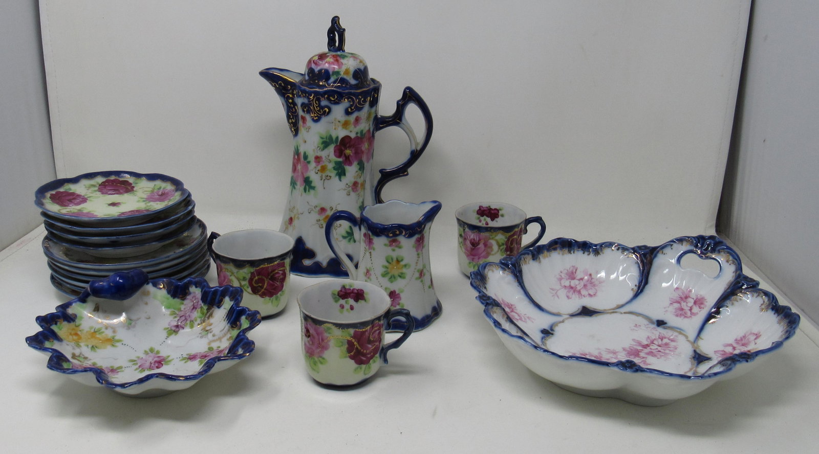 Tea Set Dinnerware: Teapot is approx 9 1/2" tall.