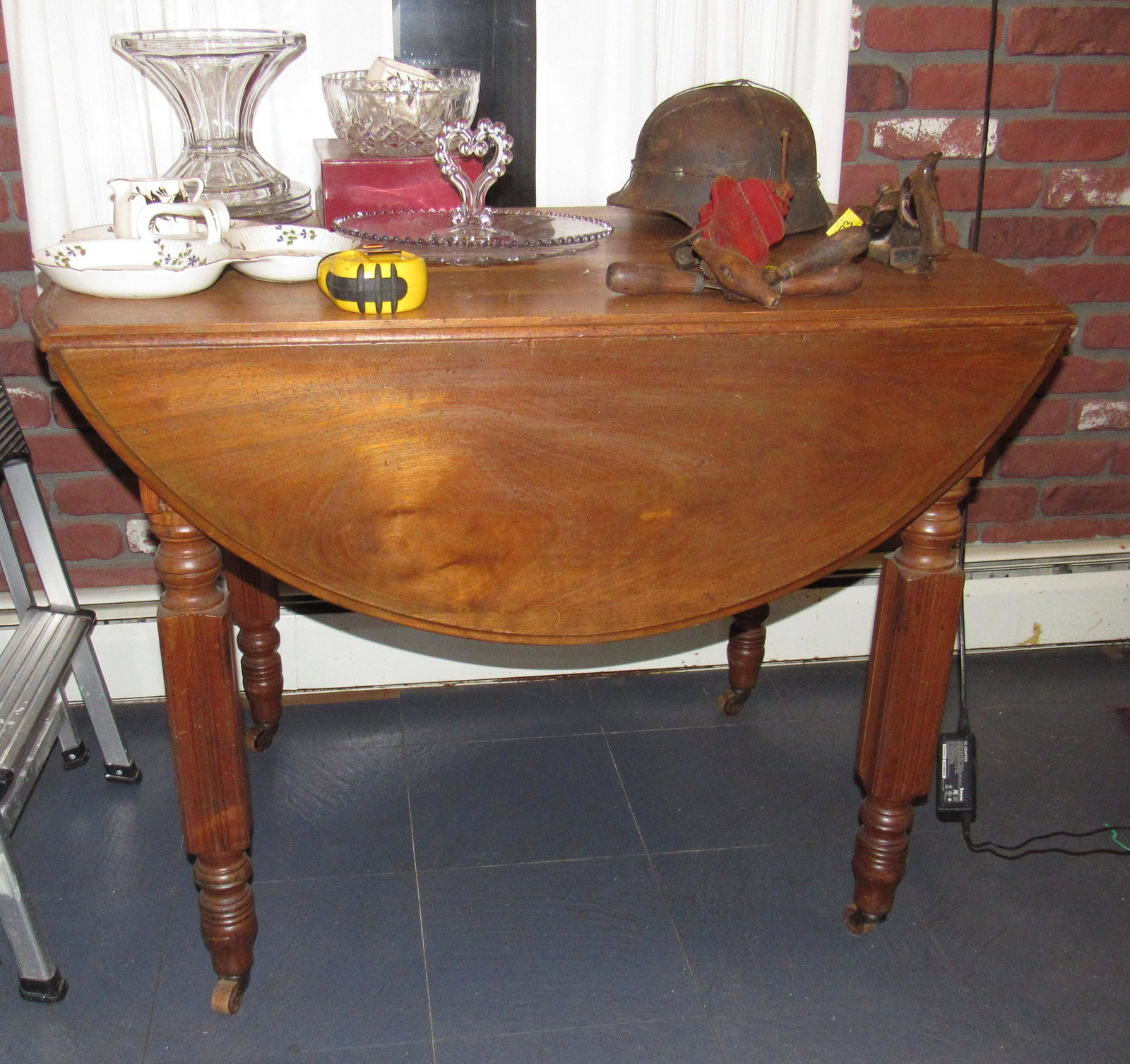 Drop Leaf Table: Approx 26" x 38 1/2" ( as pictured , with leaves down. DOES NOT INCLUDE ITEMS ON TOP