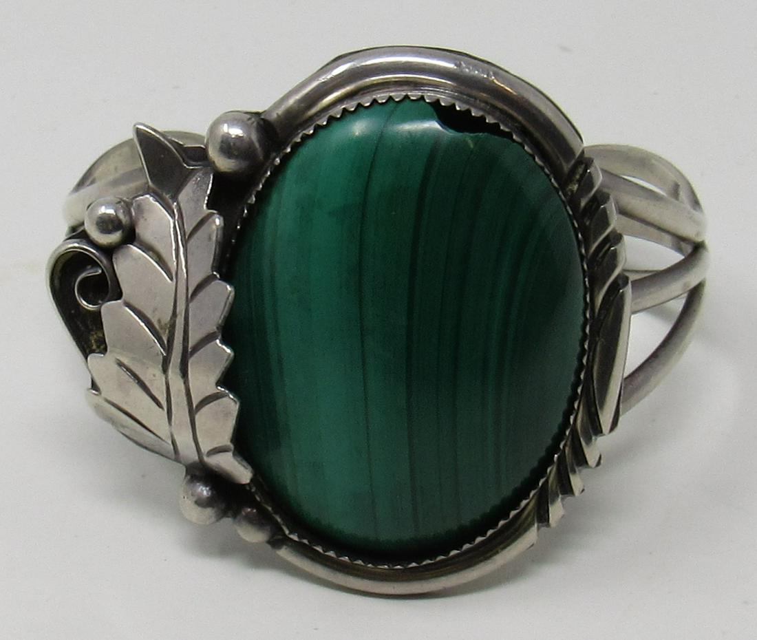 South Western "ET" Malachite Cuff Bracelet: Approx 2 1/4" inside measurement ( at widest point).