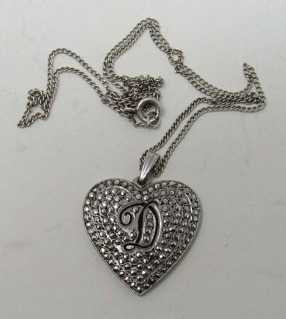Sterling Silver Chain and Heart Charm: Charm is approx 7/8" x 1" and is NOT sterling. Chain is sterling