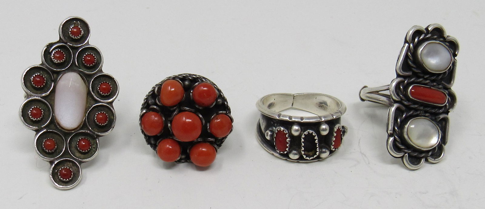 Southwestern Coral Mother of Pearl Rings: Sizes from left to right are approx 8 1/2, 6 1/2, 11 3/4, and 6 1/2