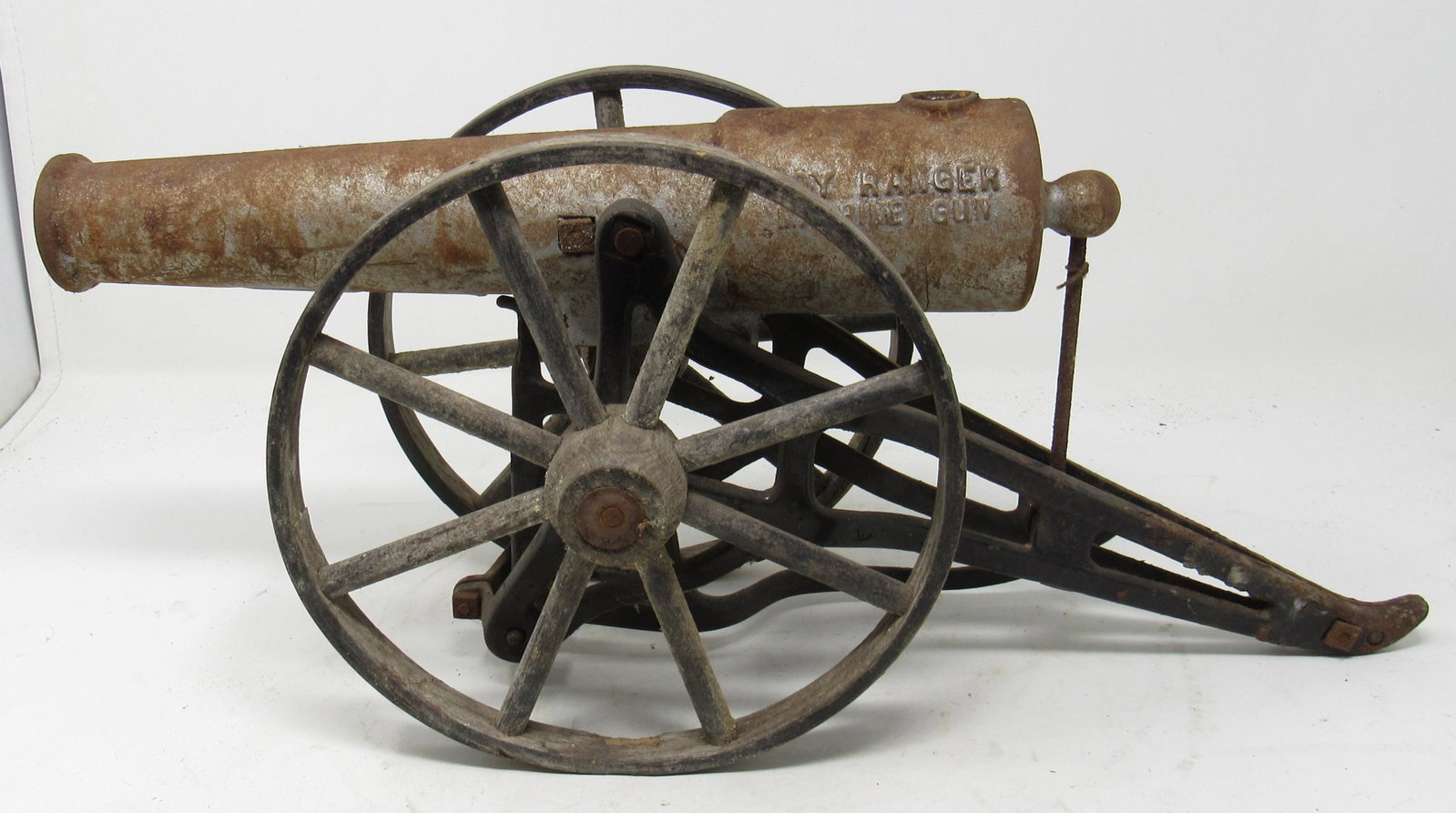Antique Boy Ranger Machine Gun Cannon: Approx 18" in total length , 5 1/2" wide, and 8" wooden wheels.