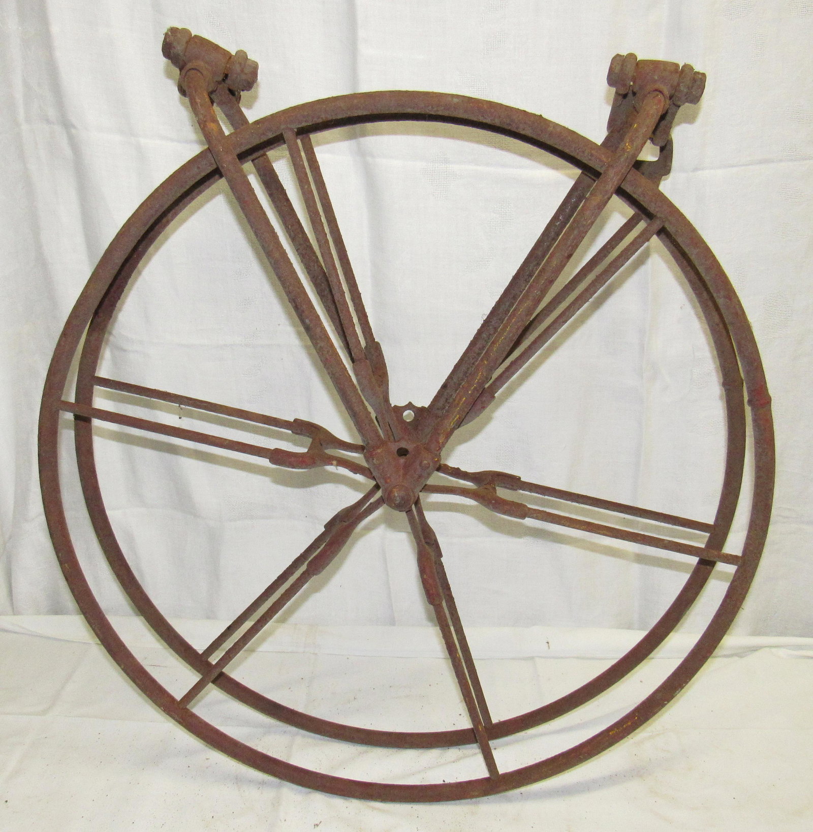 Antique Industrial Hanging Fire Hose Reel: Approx 26" in diameter.