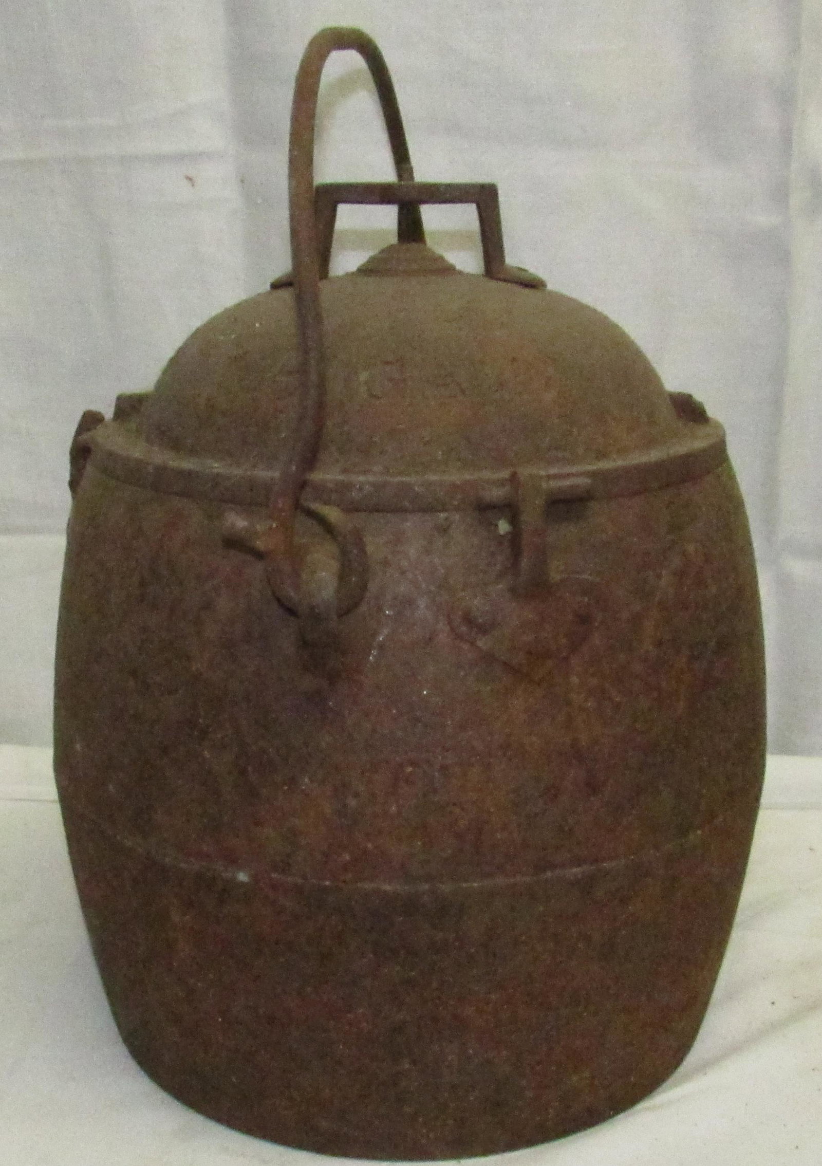 E&T Clark Cast Iron 5 Gallon Dutch Oven: Apprx 12" in diameter and 16" tall
