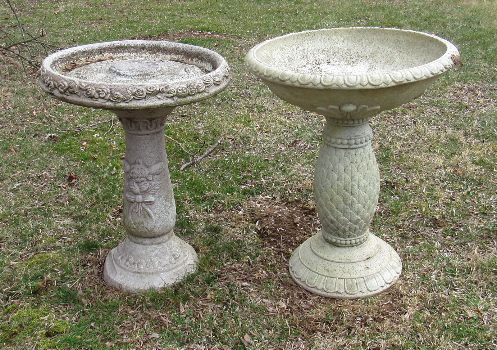2 Bird Baths and Feeders: Concrete bird bath on left ( 18" in diameter by 25" tall). Plastic bird bath on right