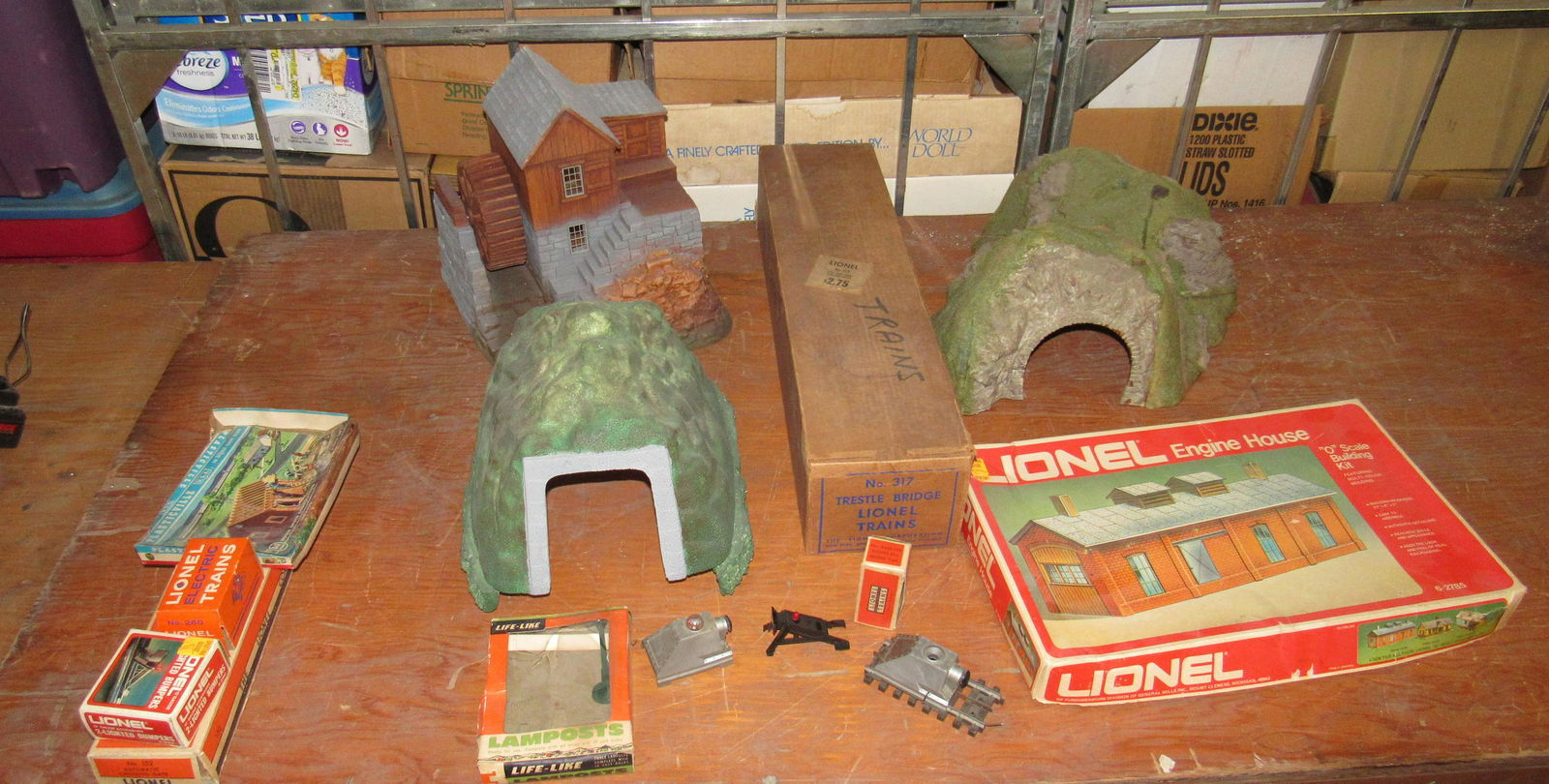 Train Tunnels Lionel 317 Trestle Bridge Table Lot: Getting all pictured. The boxes on far left are empty. The engine house box, has misc parts ( as pictured)