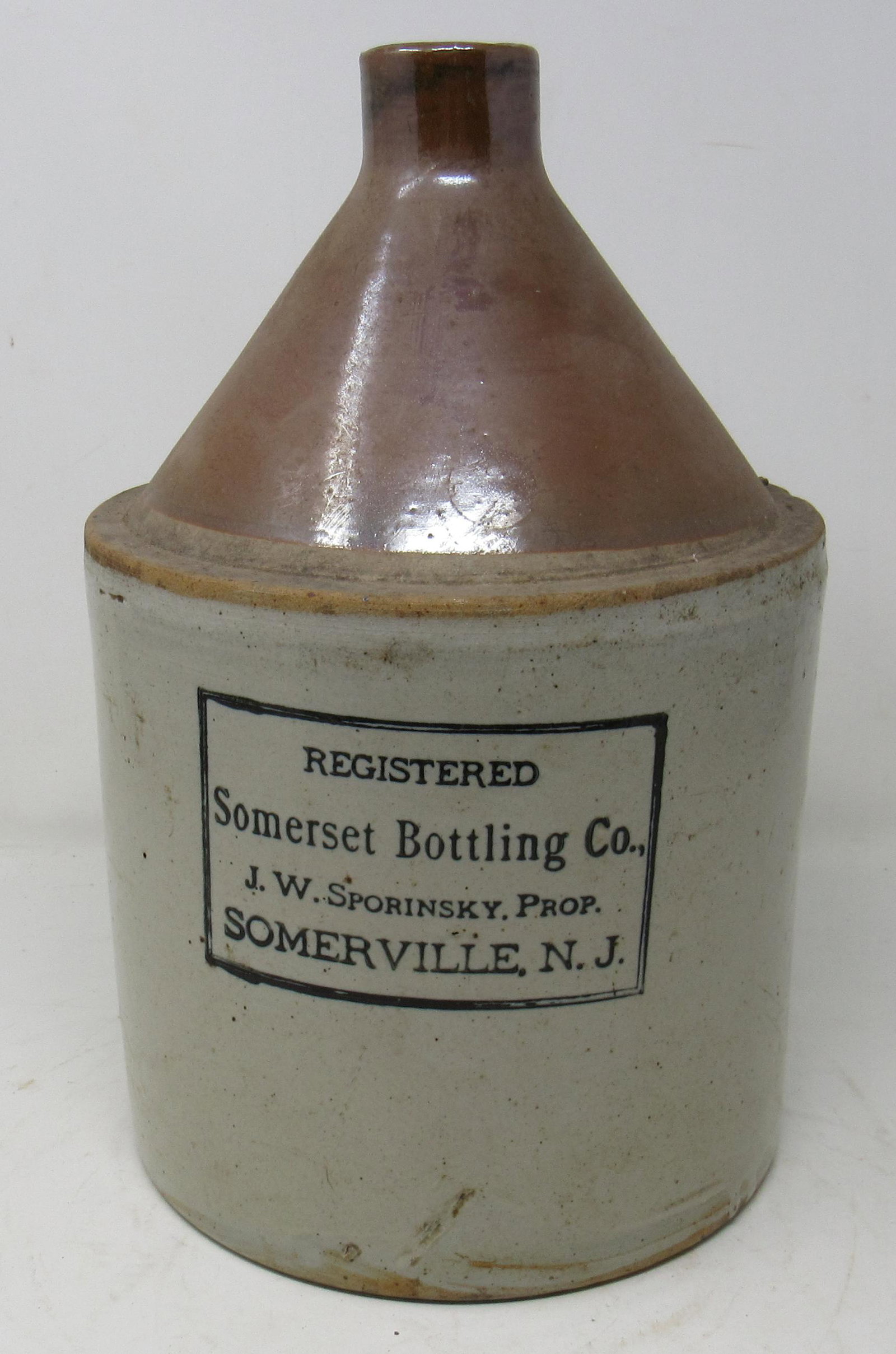 Somerset Bottling Co. Somerville NJ Jug: JW Sporinsky stoneware jug. Apprx 11 1/2" tall.