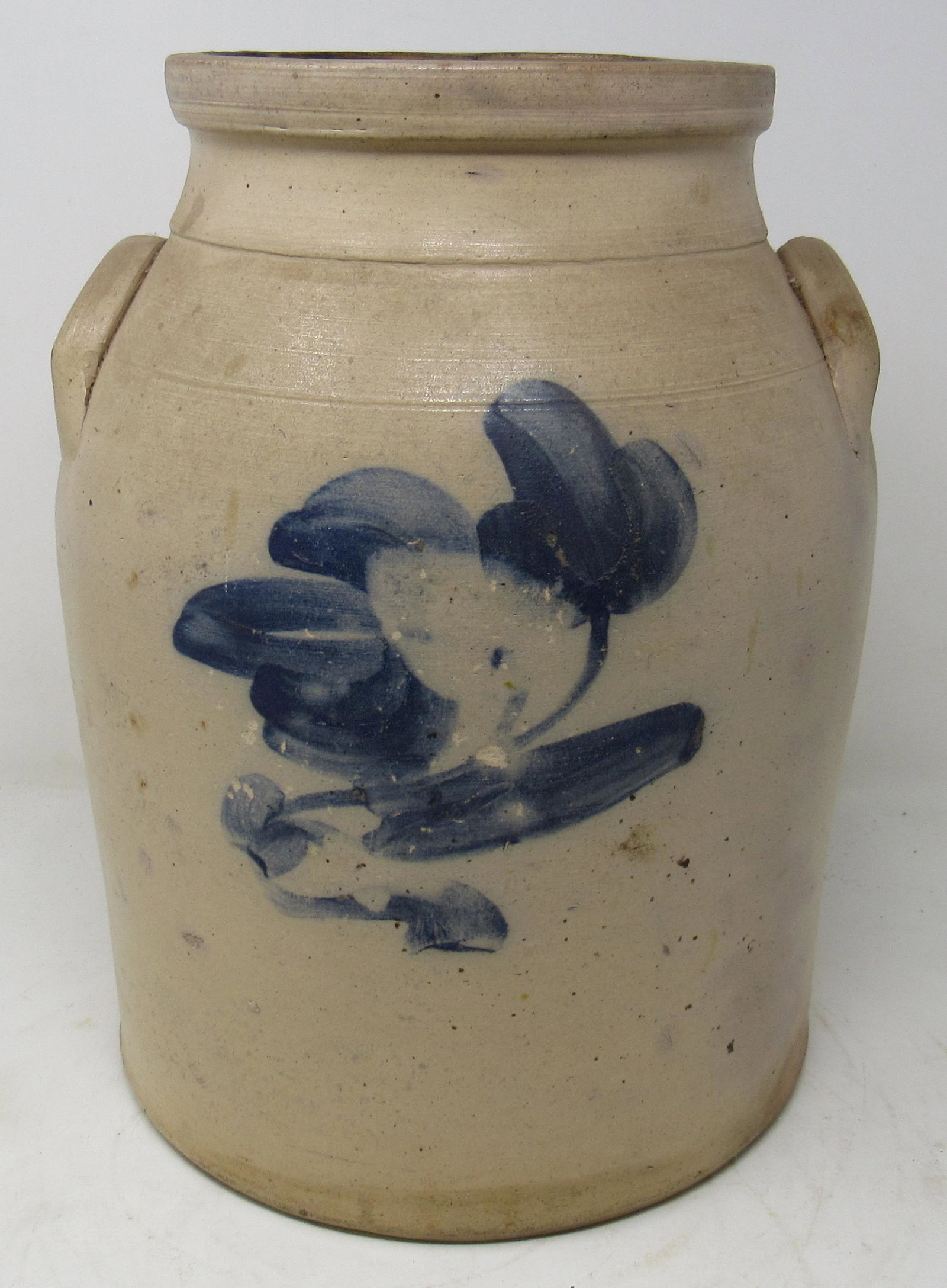 AJ Buttler Blue Decorated Stoneware Butter Churn: New Brunswick NJ . Approx 8 3/4" in diameter and 12 1/4" tall.