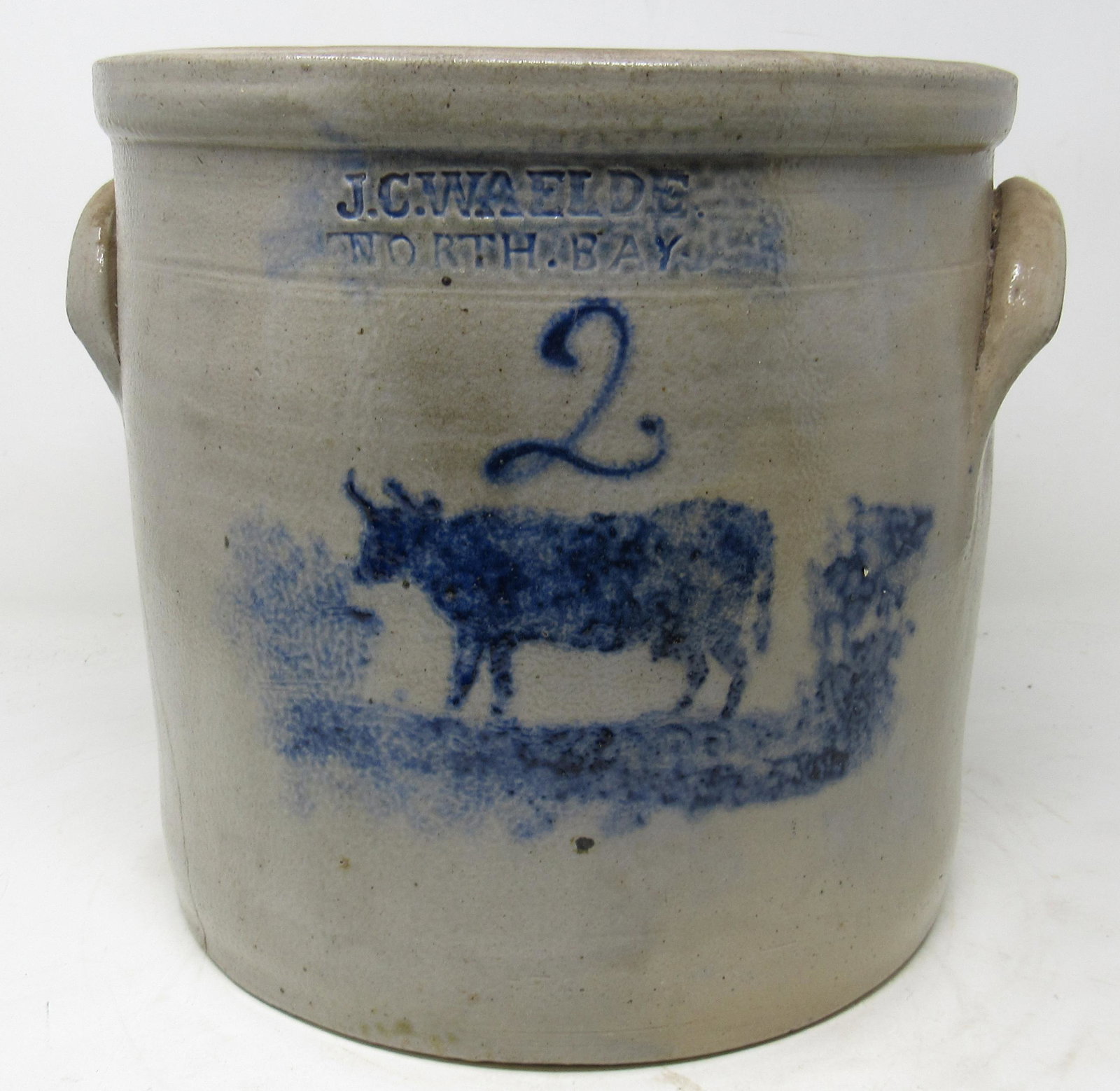 JC Waelde North Bay Stoneware Cow Crock: 2 gallon crock is approx 9 1/2" in diameter and 9 1/2" tall.