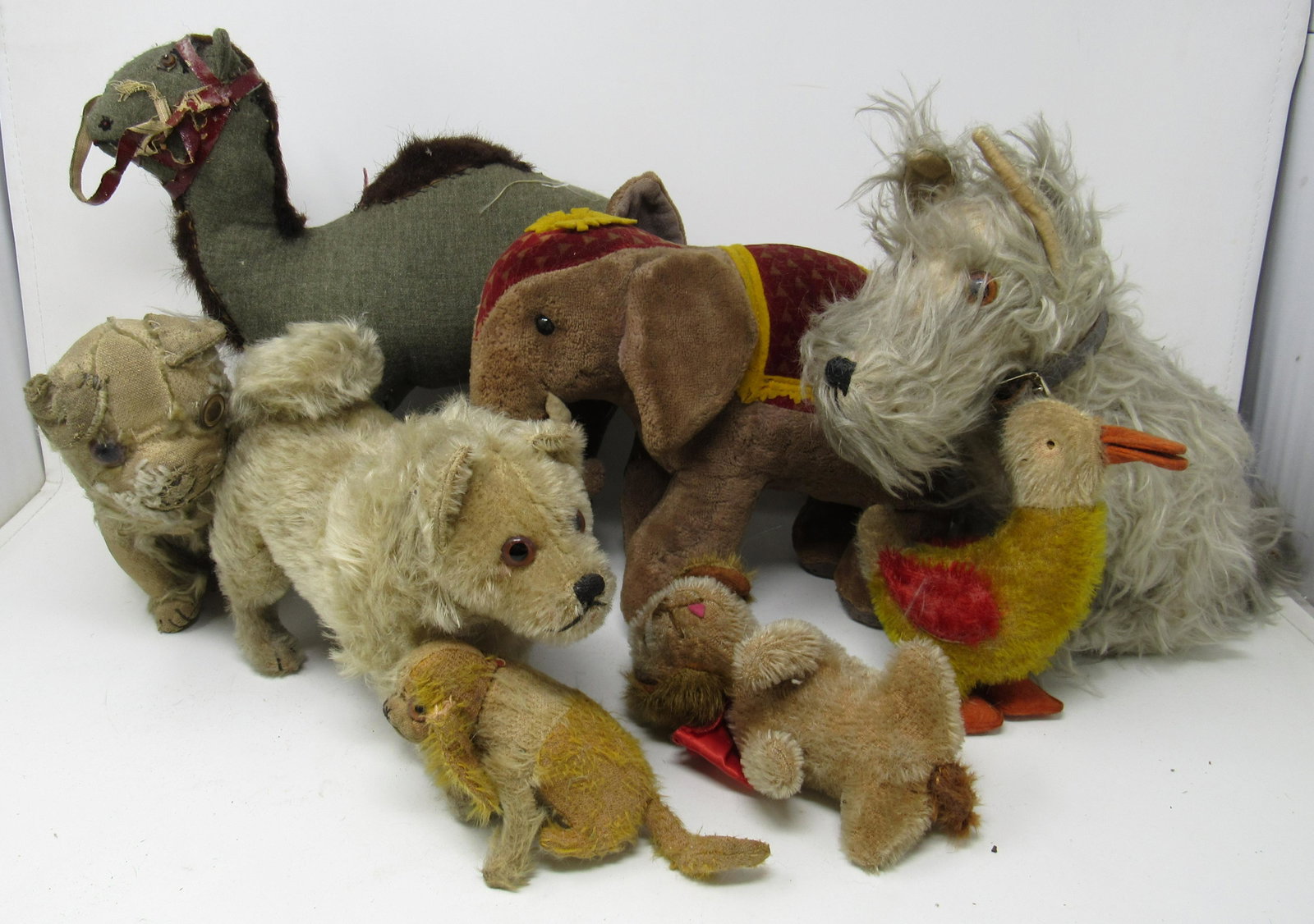 Early Stuffed Animals Incl Mohair Steiff ??: Getting all pictured. Could be some steiff ??