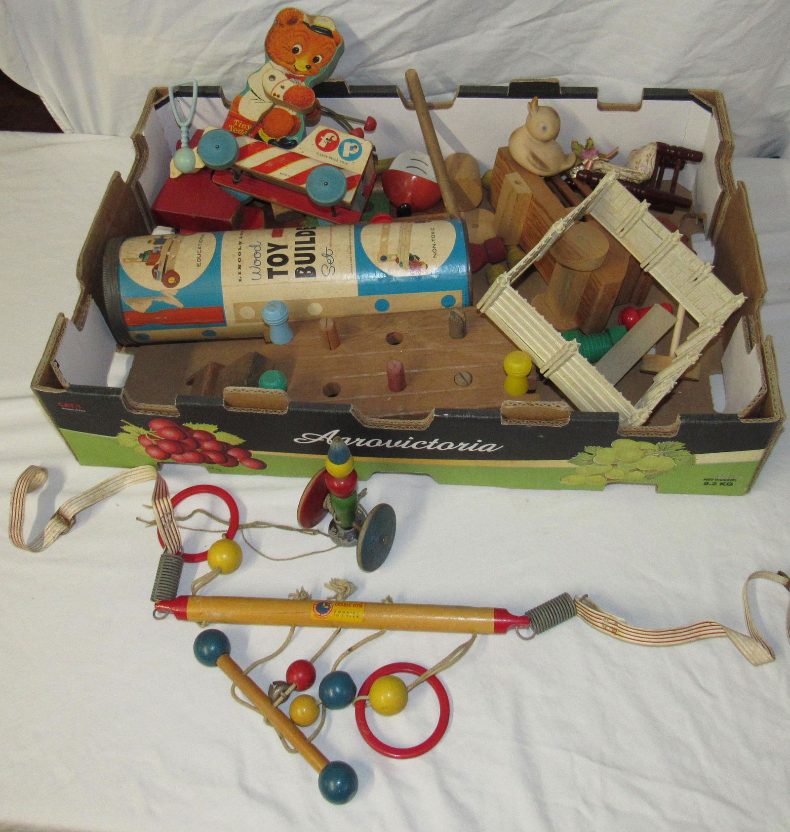 Box of Misc Wooden Toys Incl Fisher Price: Getting all in box.