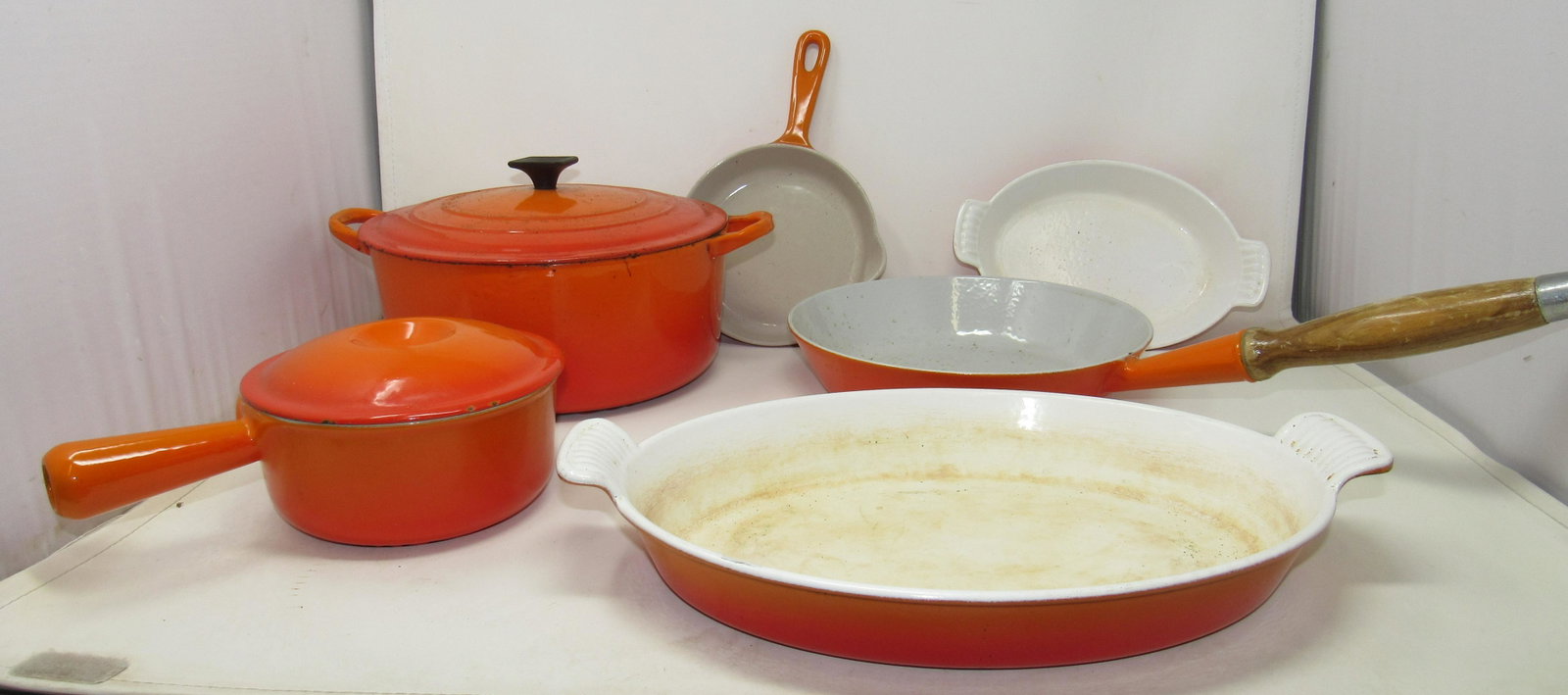 LeCreuset Enameled Pots Pans Casseroles: Largest pot is approx 9 3/4" in diameter and 7 1/2" tall ( top of lid)