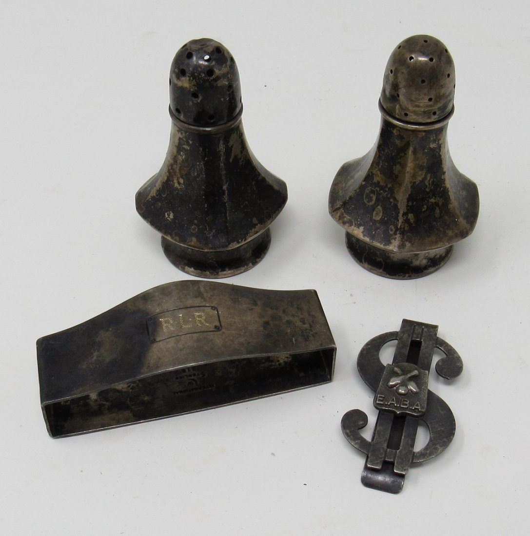 Sterling Silver Salt & Peppers Napkin Ring: The money clip is not marked or said to sterling.The weight of the shakers and napkin ring is approx 55 grams.