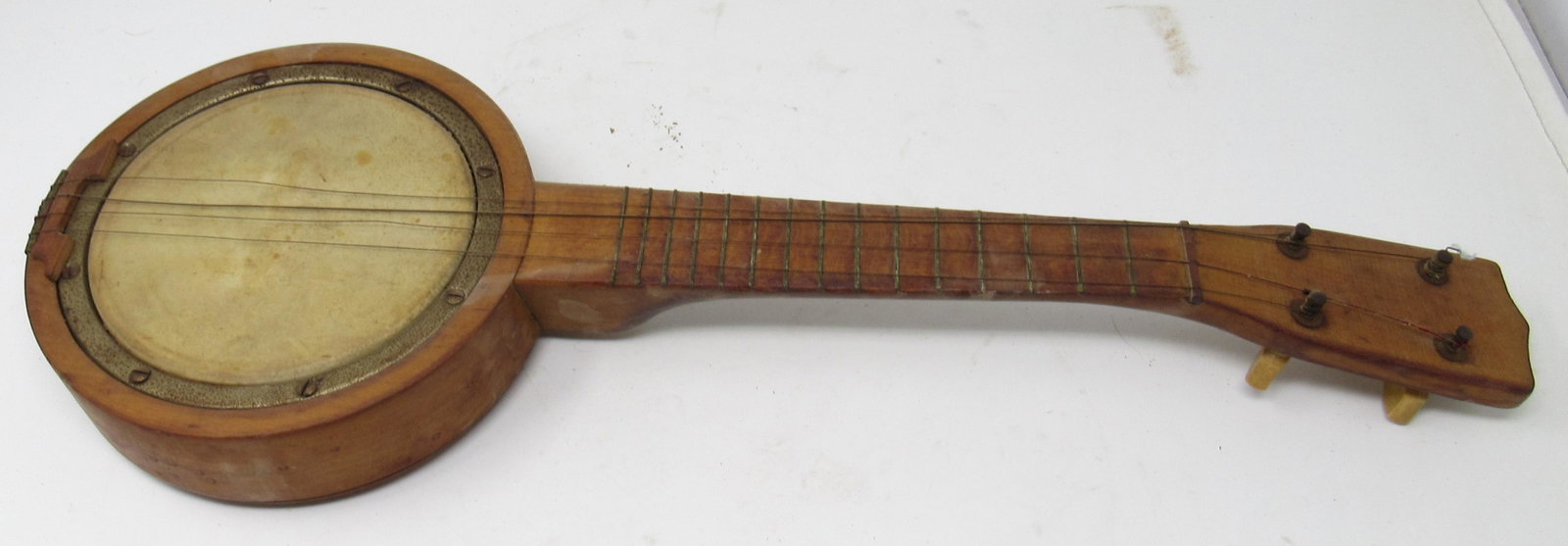 Vintage Miniature Banjo: Approx 7" in diameter and 21" long.